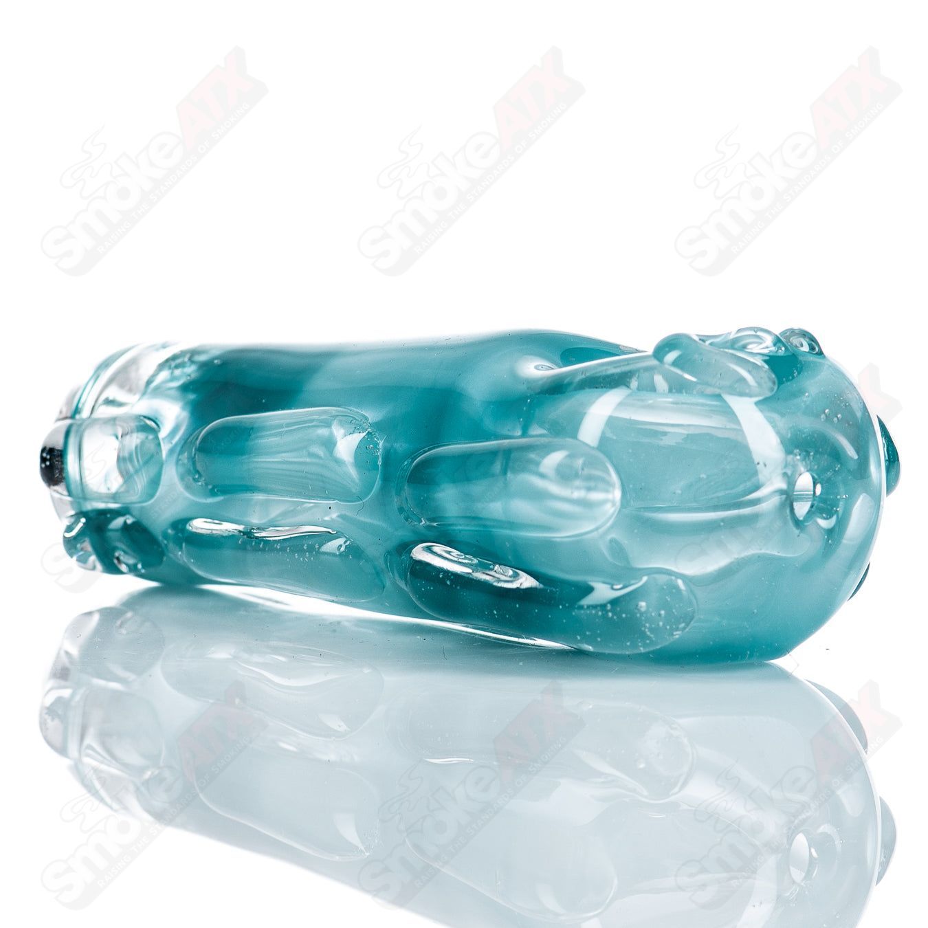 Glass pipe called Spoon Glass by Nobody featuring a clear, rounded bowl and smooth glass finish.