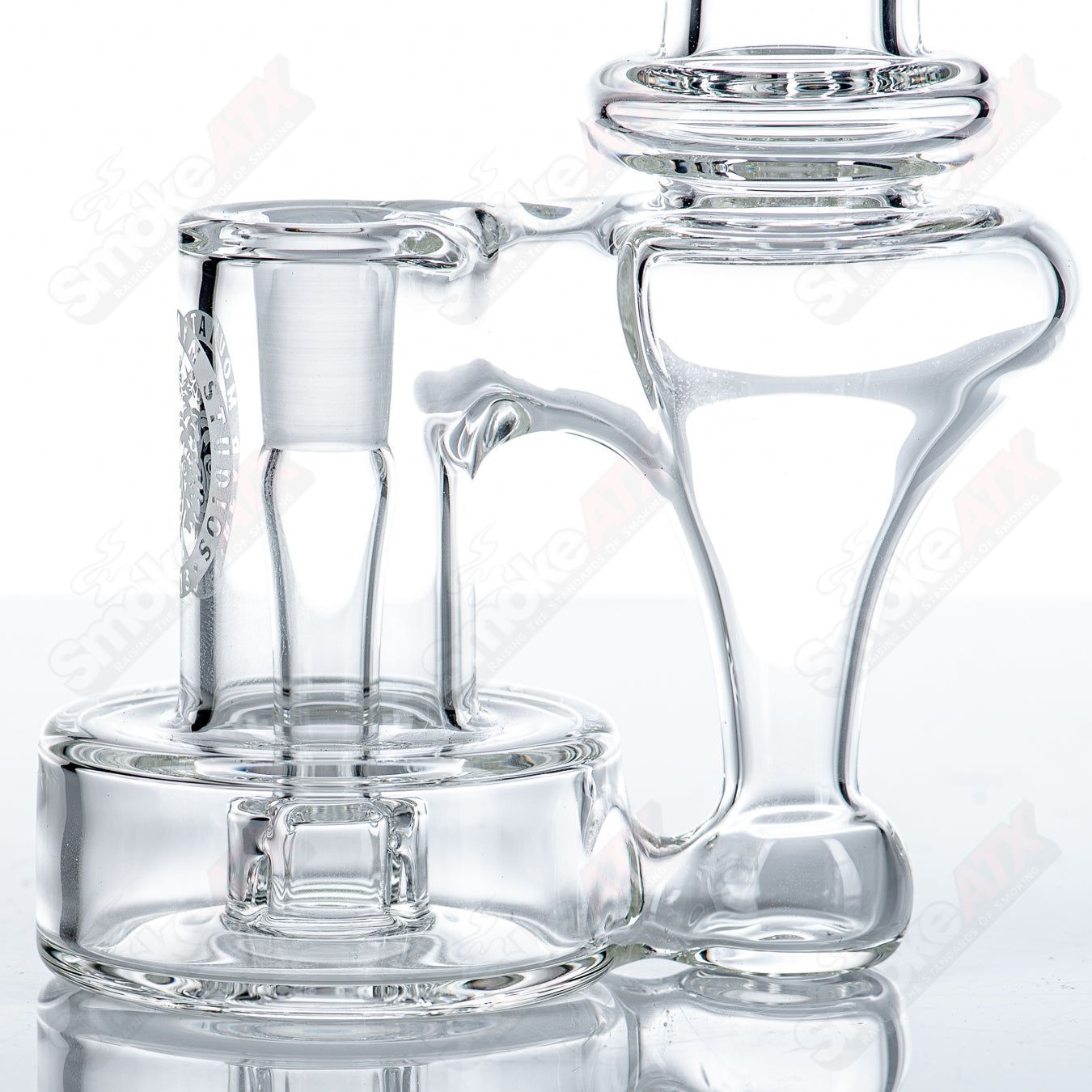 10mm Micro RBR by Bear Mountain Studios, a colorful heady glass concentrate rig with intricate design and compact size.