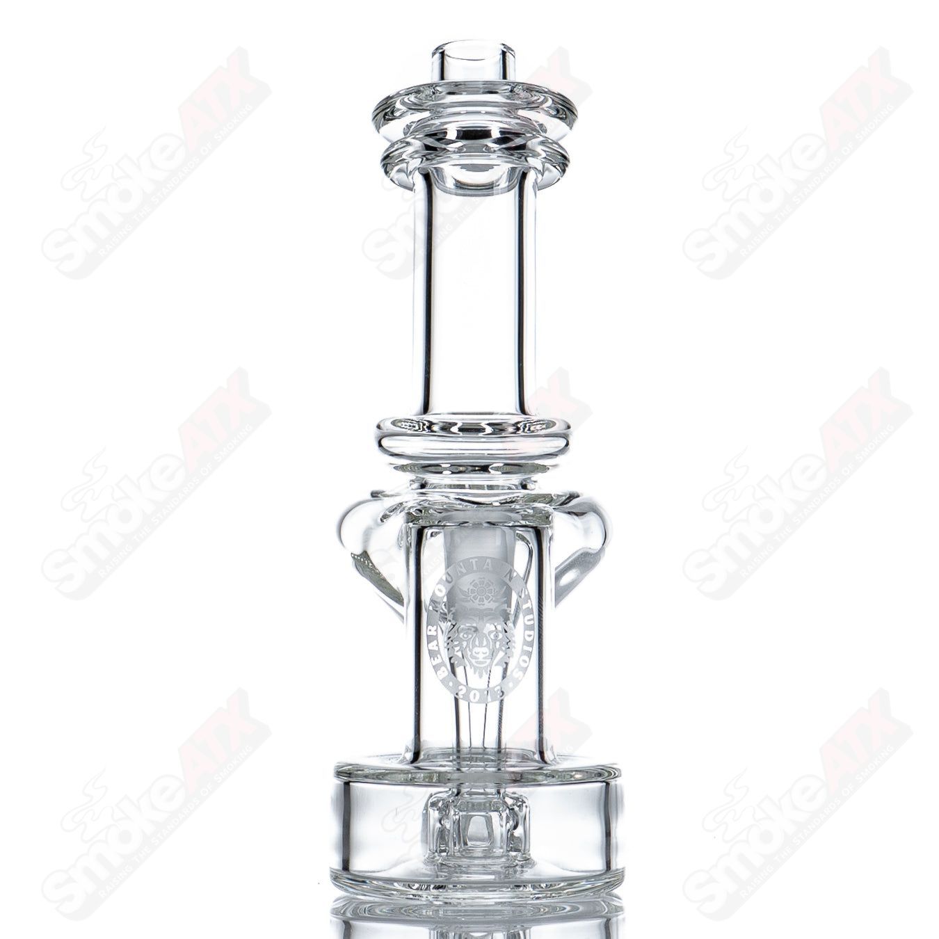10mm Micro RBR concentrate rig by Bear Mountain Studios, featuring clear heady glass with intricate designs and a compact build.