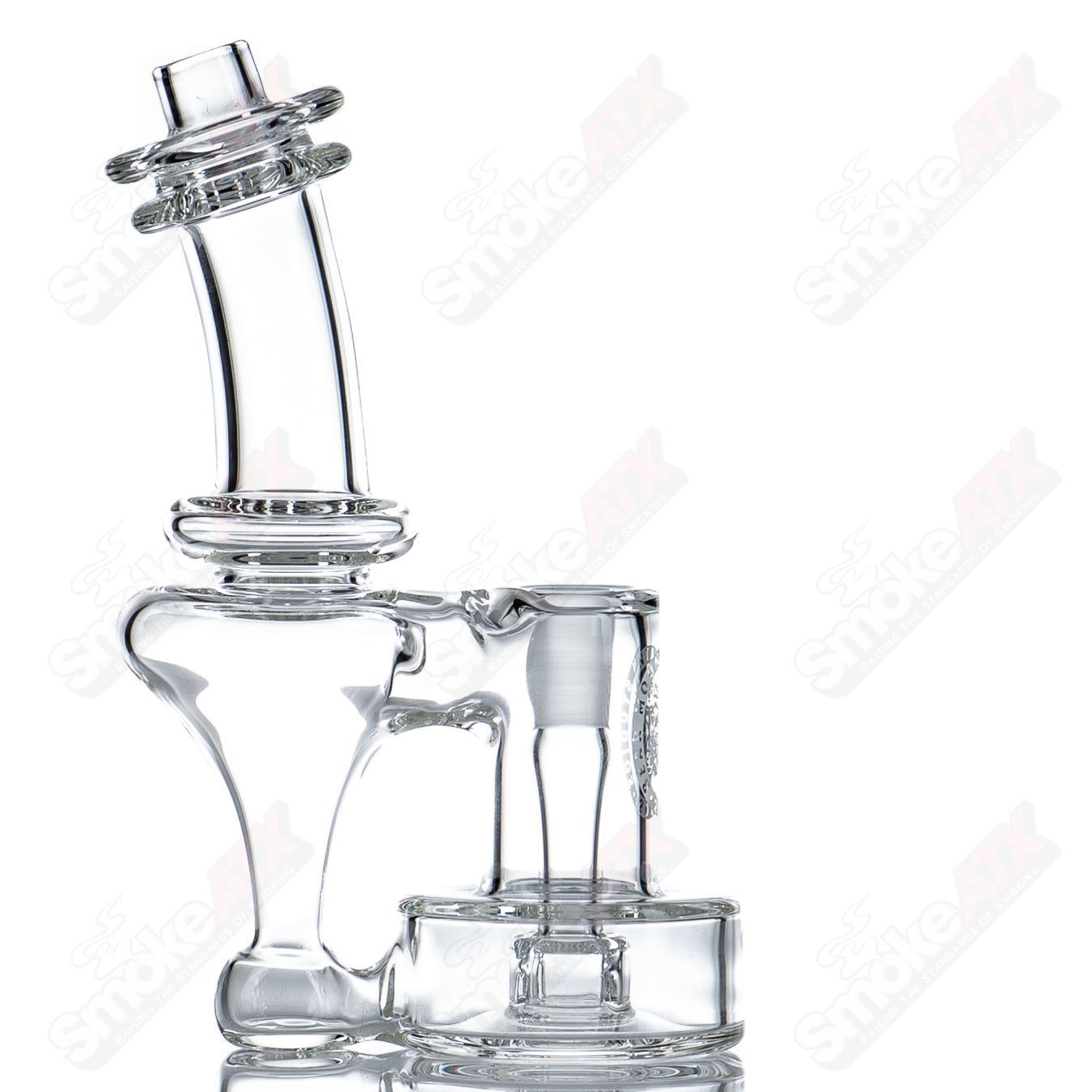 10mm Micro RBR concentrate rig by Bear Mountain Studios, featuring clear heady glass with intricate designs and a compact build.