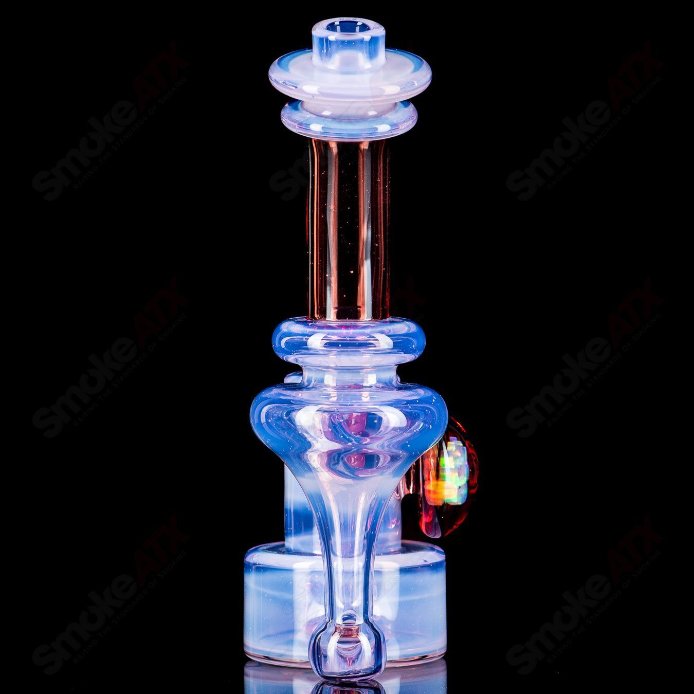 10mm Micro RBR Neo Rose/Pomegranate heady glass concentrate rig by Bear Mountain Studios with intricate glasswork and vibrant colors.