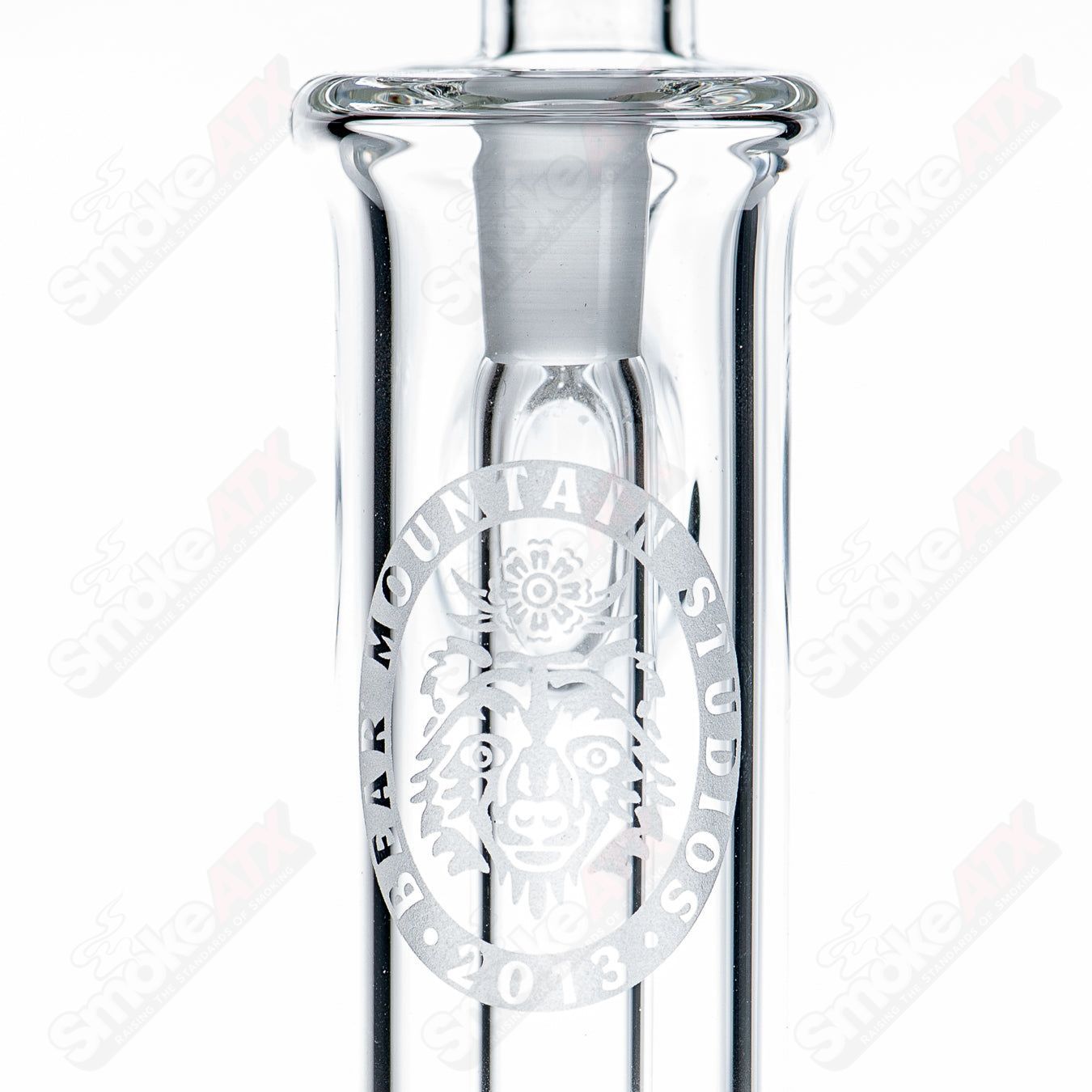 10mm Mini Bubbler by Bear Mountain Studios, vibrant heady glass concentrate rig with colorful swirling patterns and compact design.