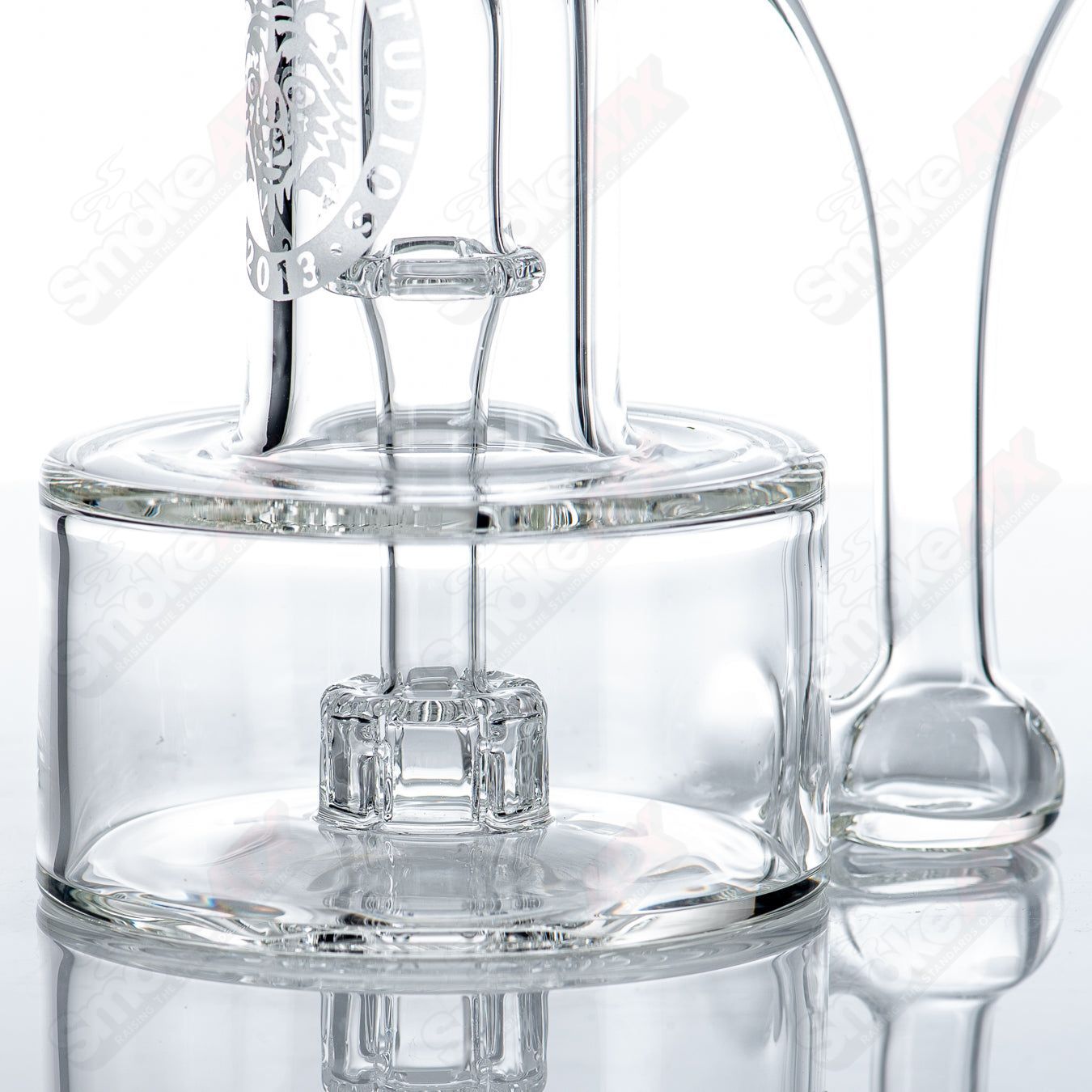 10mm Mini Double Diffused RBR concentrate rig by Bear Mountain Studios, clear glass with intricate diffusion patterns.