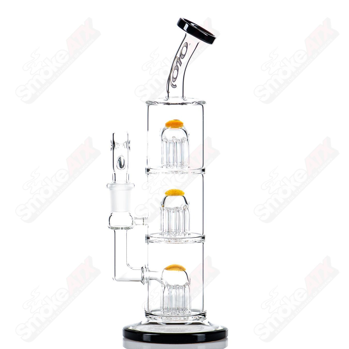 Toro Glass 10mm Triple Macro Bubbler featuring intricate glass design and clear craftsmanship.
