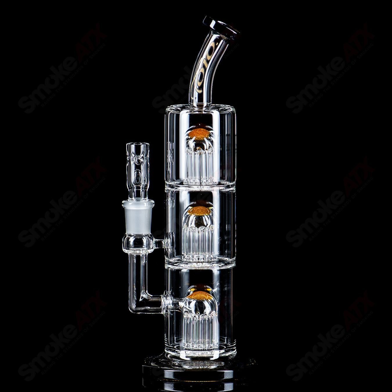 Toro Glass 10mm Triple Macro Bubbler with intricate glass design, showcasing the detailed craftsmanship of this premium smoking accessory.