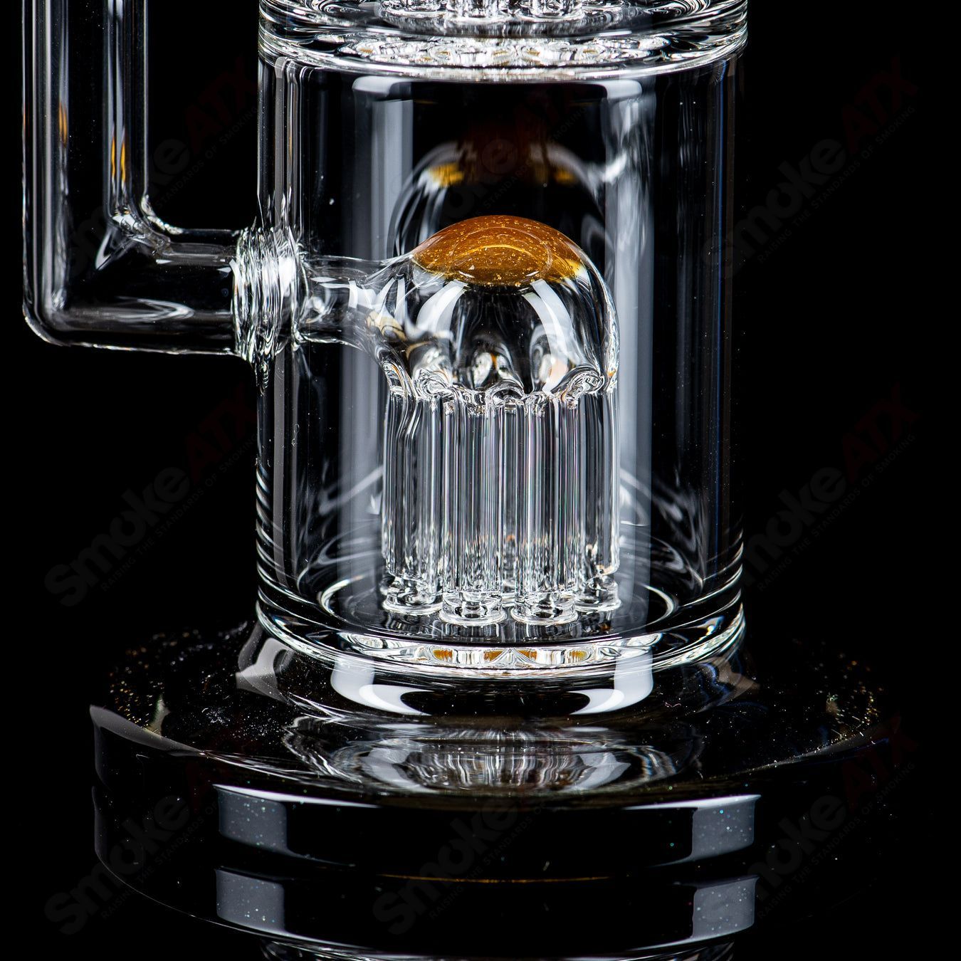 Toro Glass 10mm Triple Macro Bubbler showcasing clear glass with intricate macro details and smooth rounded edges.