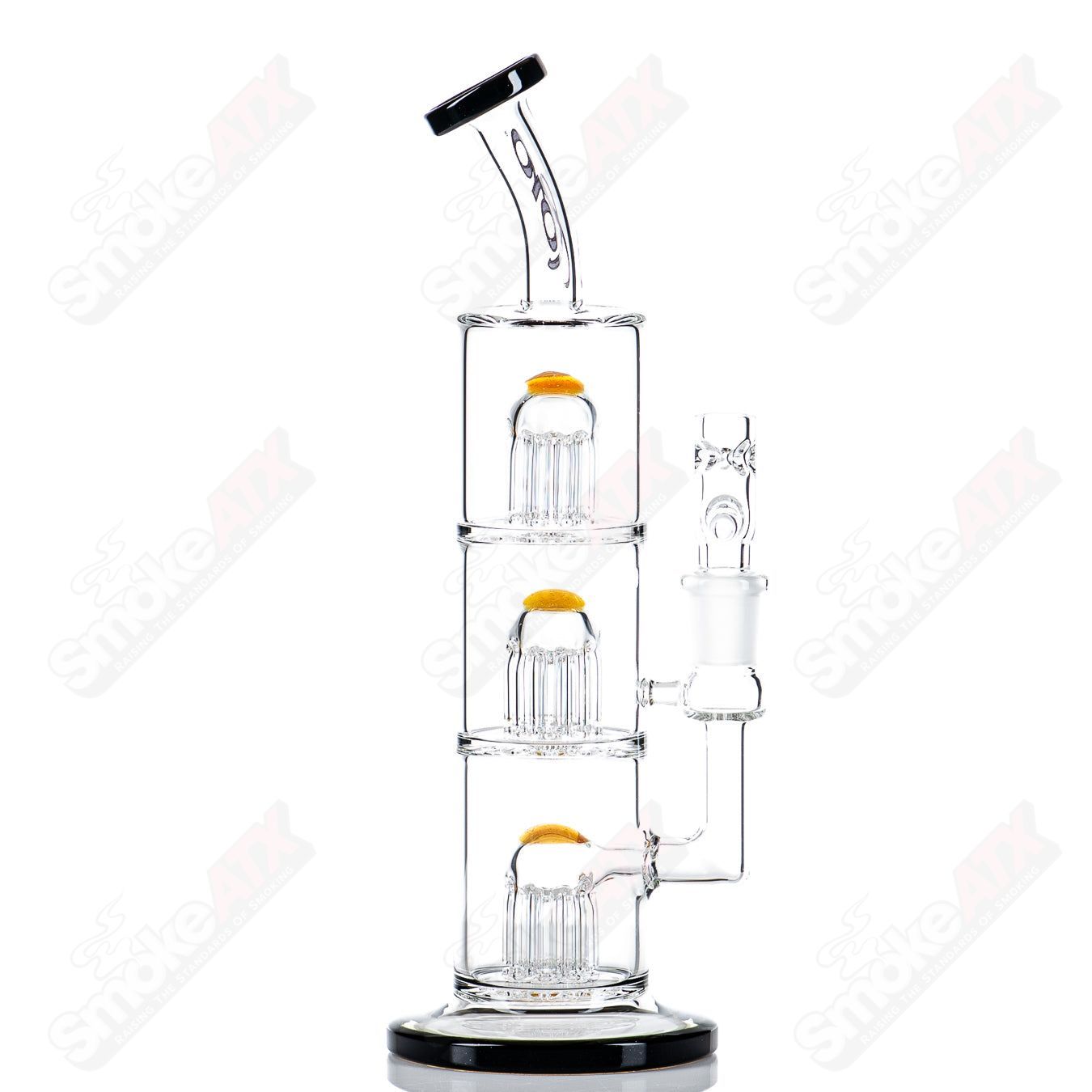 Toro Glass 10mm Triple Macro bubbler with intricate glass design and clear body, showcasing detailed craftsmanship and smooth shape.