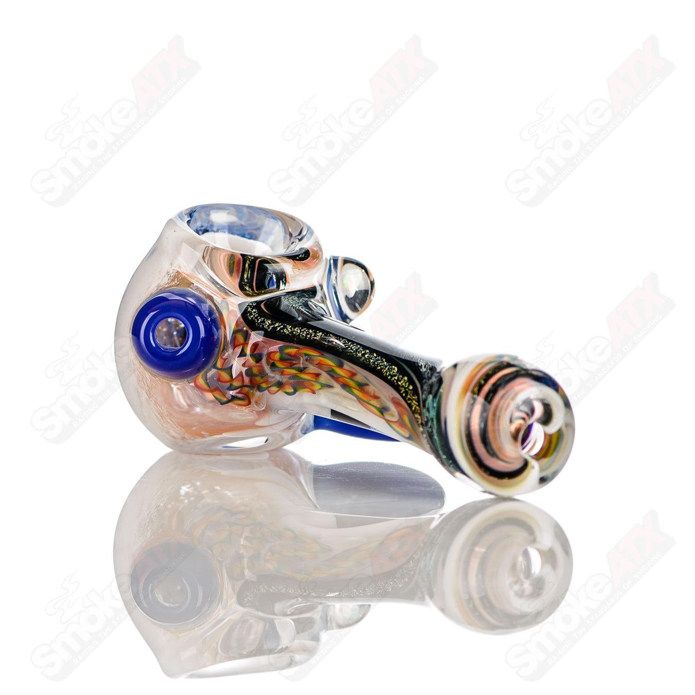 Colorful IO spoon pipe by Jeremy from Oregon, hand-blown heady glass with intricate 11-color worked design.