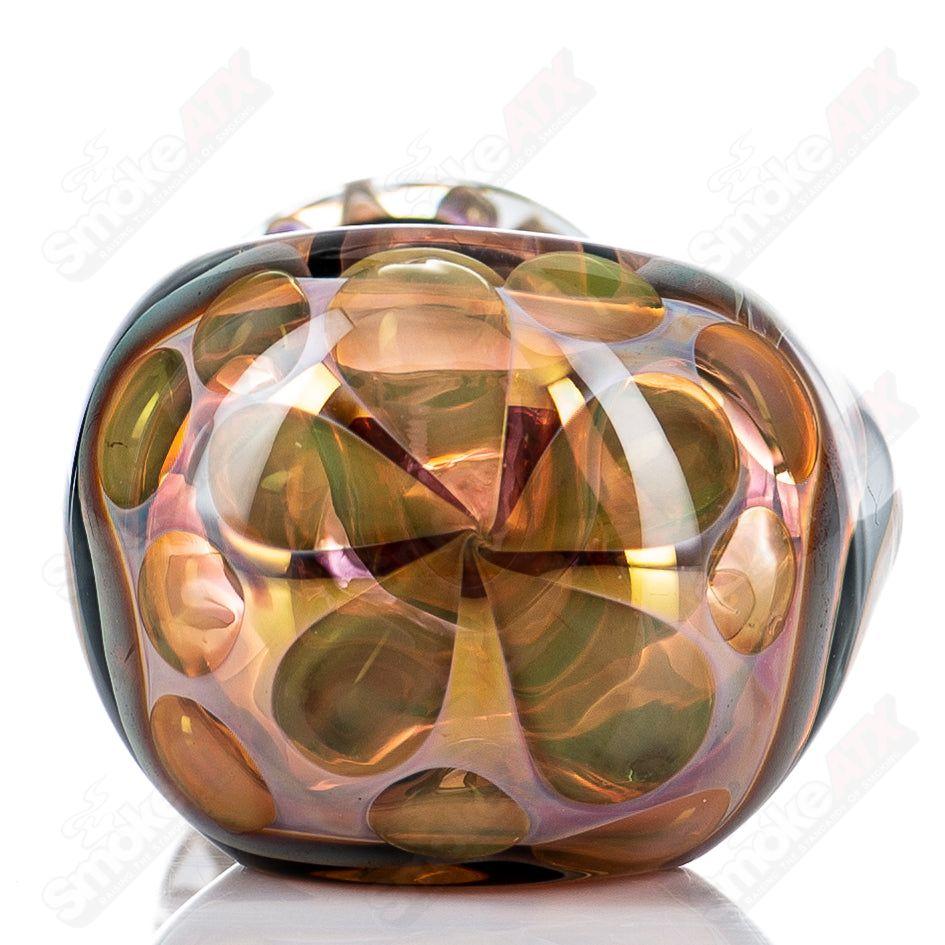 Glass pipe featuring gold and silver fume design, I/O spoon style by Shane Smith with detailed glasswork and vibrant metallic accents.
