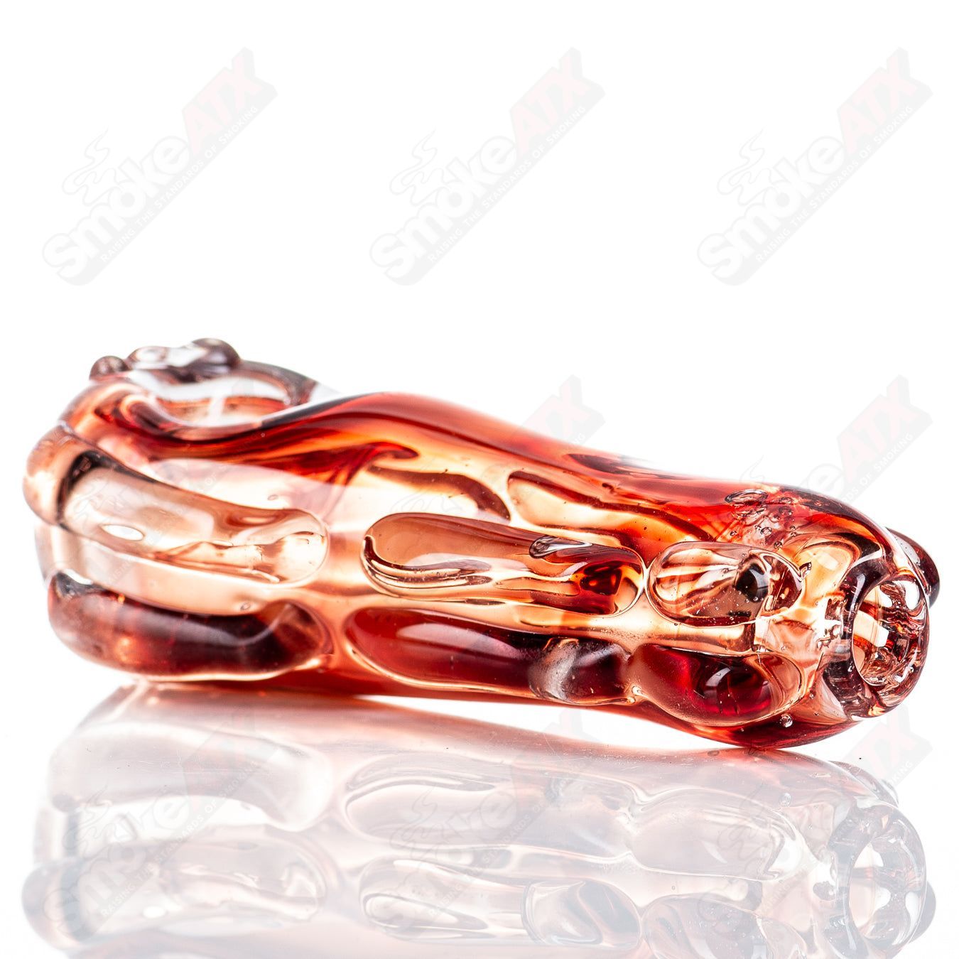 Clear glass spoon pipe by Nobody, featuring a rounded bowl and smooth glass finish, designed for smoking use.