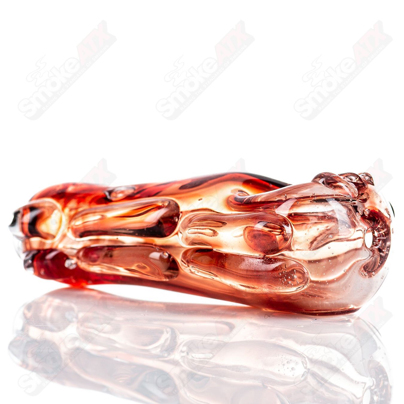 Glass pipe called Spoon Glass by Nobody, clear glass with a rounded bowl and slender stem, designed for smoking.
