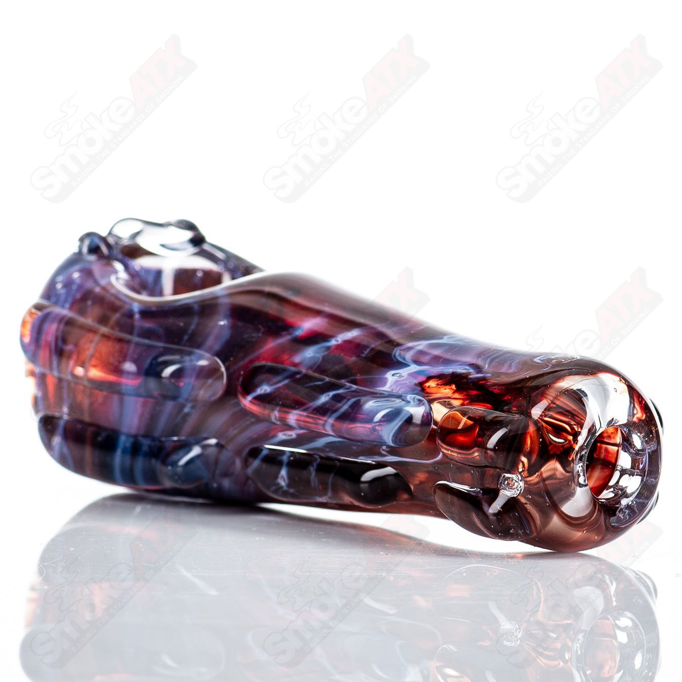 Glass pipe titled Spoon Glass by Nobody, showcasing clear glass with a smooth, rounded spoon-shaped bowl and a sturdy base.