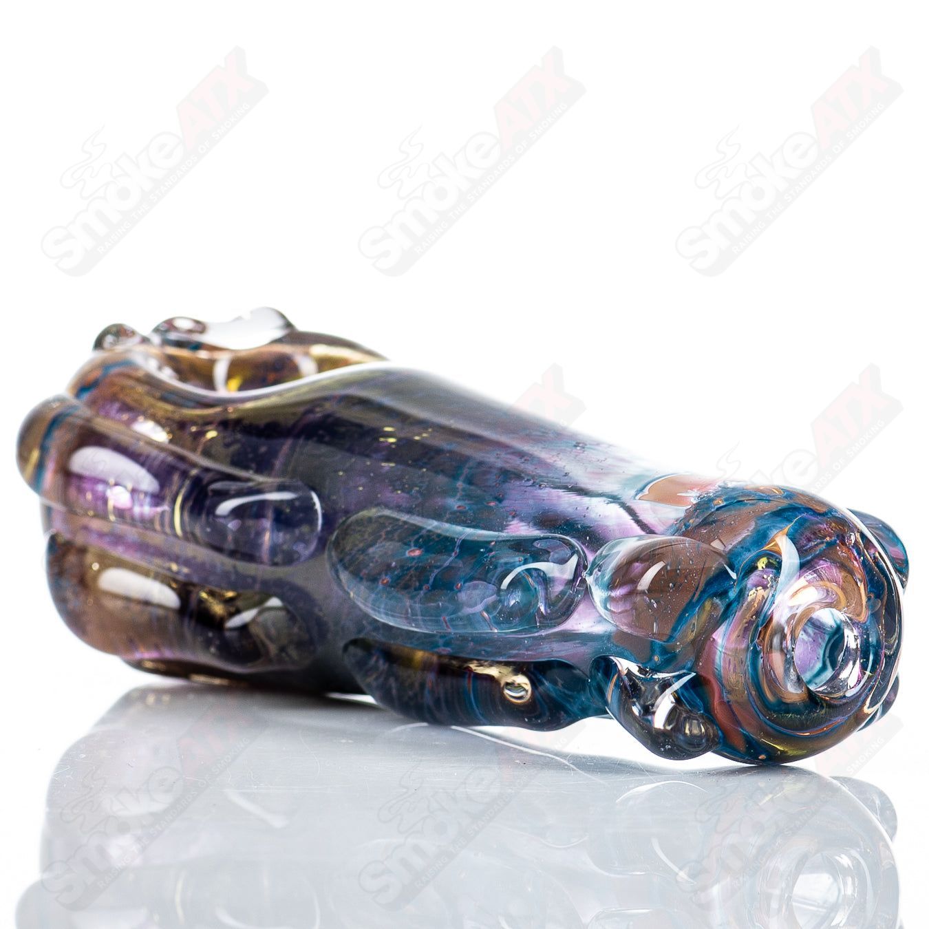 Clear glass spoon pipe by Nobody with a smooth, rounded bowl and slender stem, designed for smoking use.