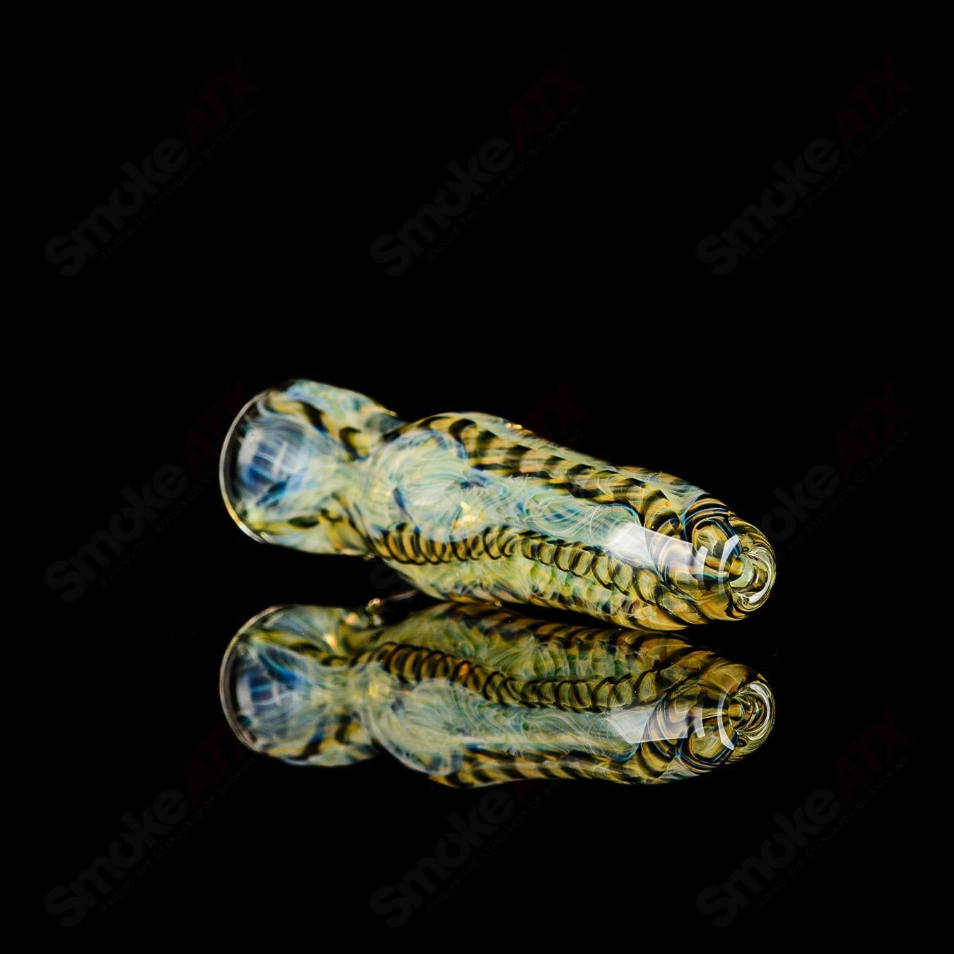 JMK Glass signed #12 I/O Worked Chillum, clear glass smoking pipe with intricate worked design and signature detailing.