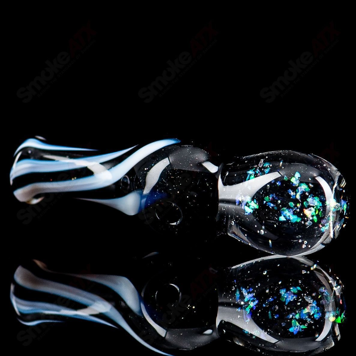 UV-reactive Puffco Joystick Indo by Geoff Made Glass, heady glass Puffco top featuring vibrant colors and intricate design details.