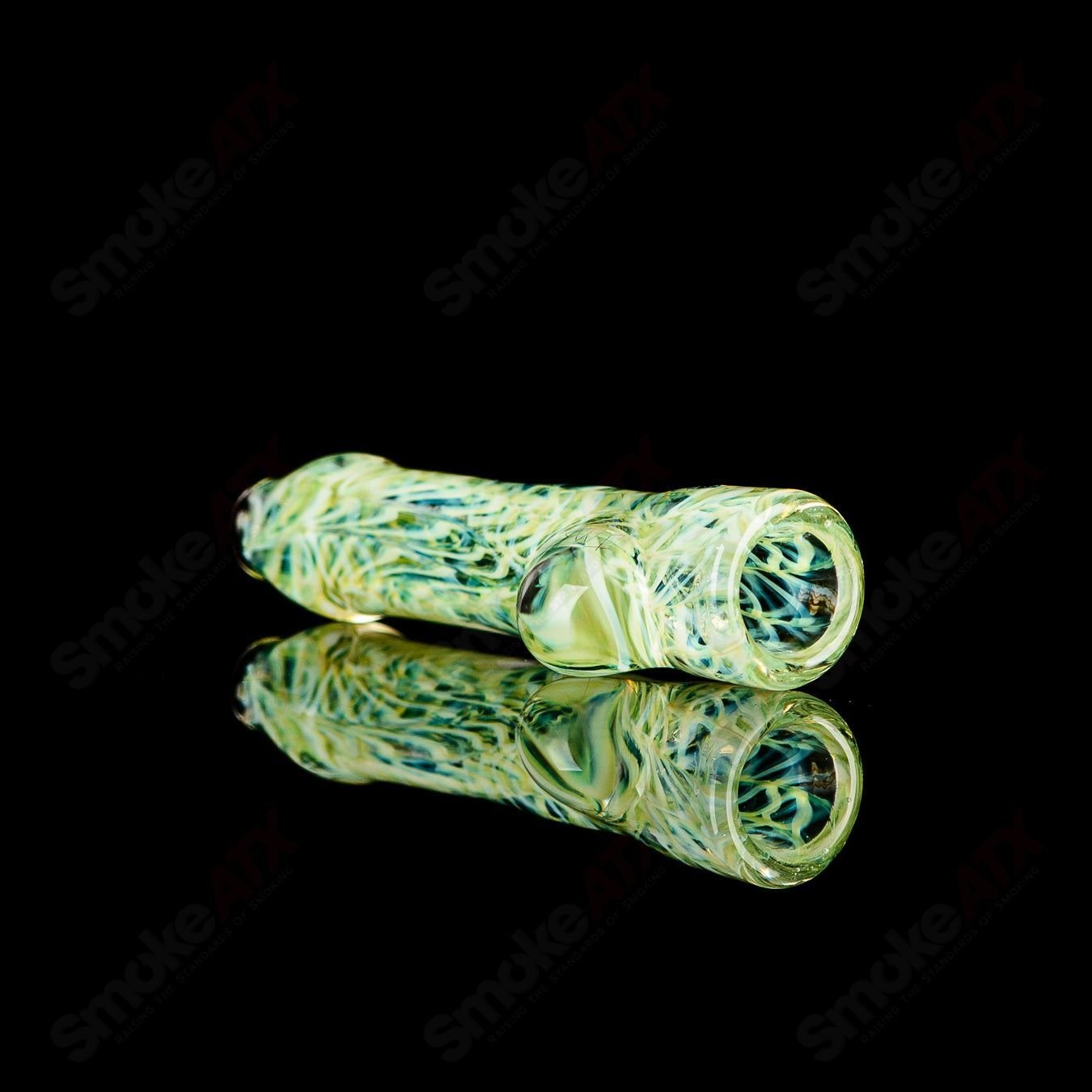 JMK Glass signed #13 I/O Worked Chillum made of clear glass with intricate worked details, designed for smoking.
