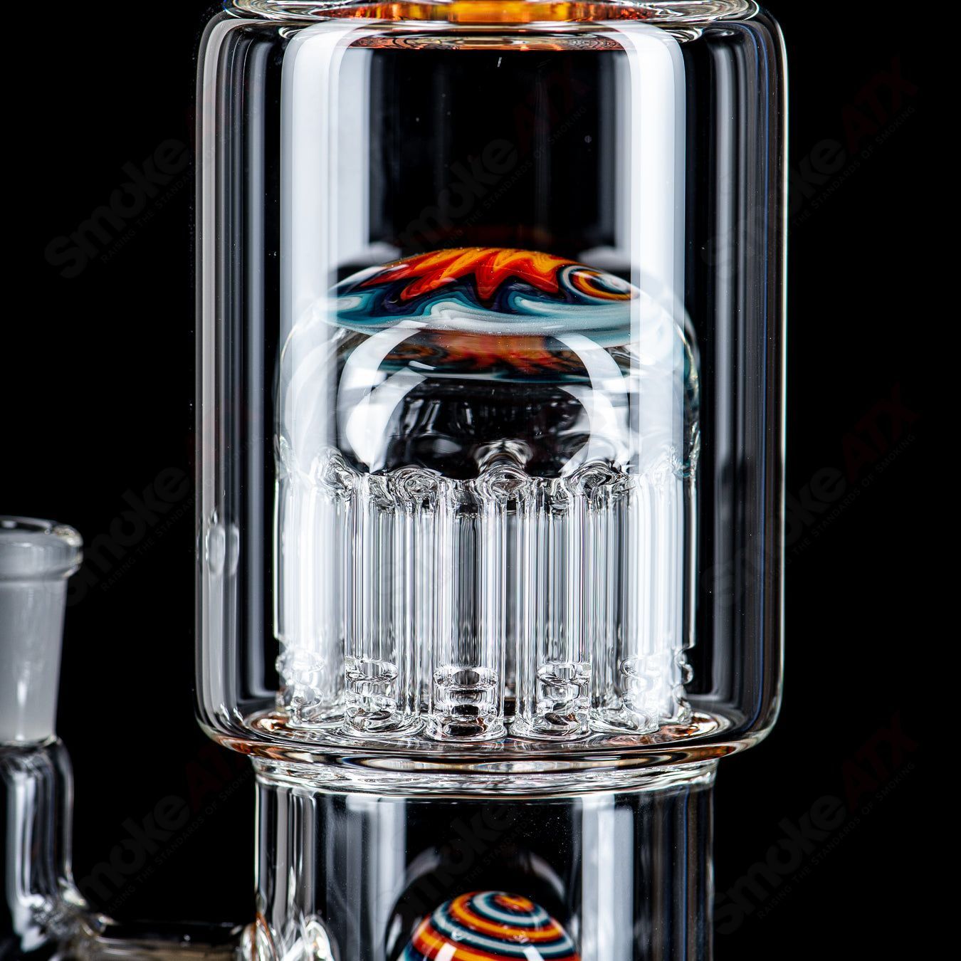 Toro Glass 14mm circular to 13-arm perc straight tube with reversal sections, showcasing intricate glasswork and clear design.