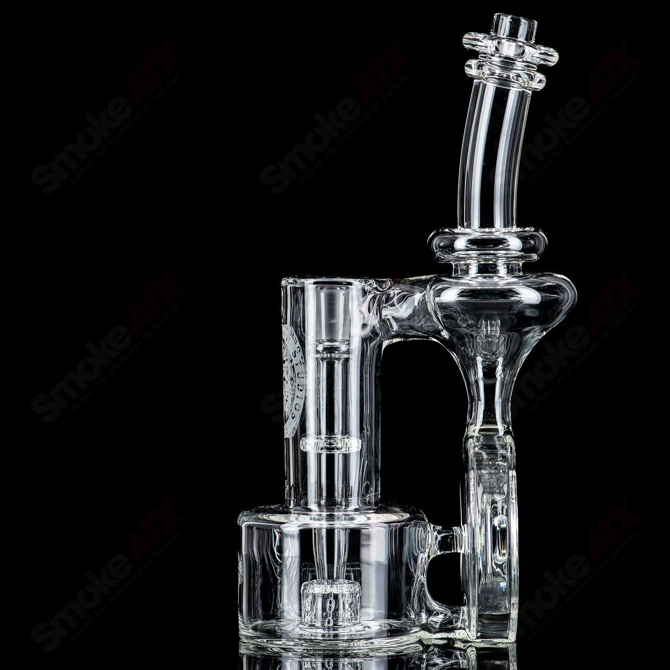 Clear 14mm double diffused Halo RBR concentrate rig by Bear Mountain Studios, featuring intricate glass details and a sturdy design.