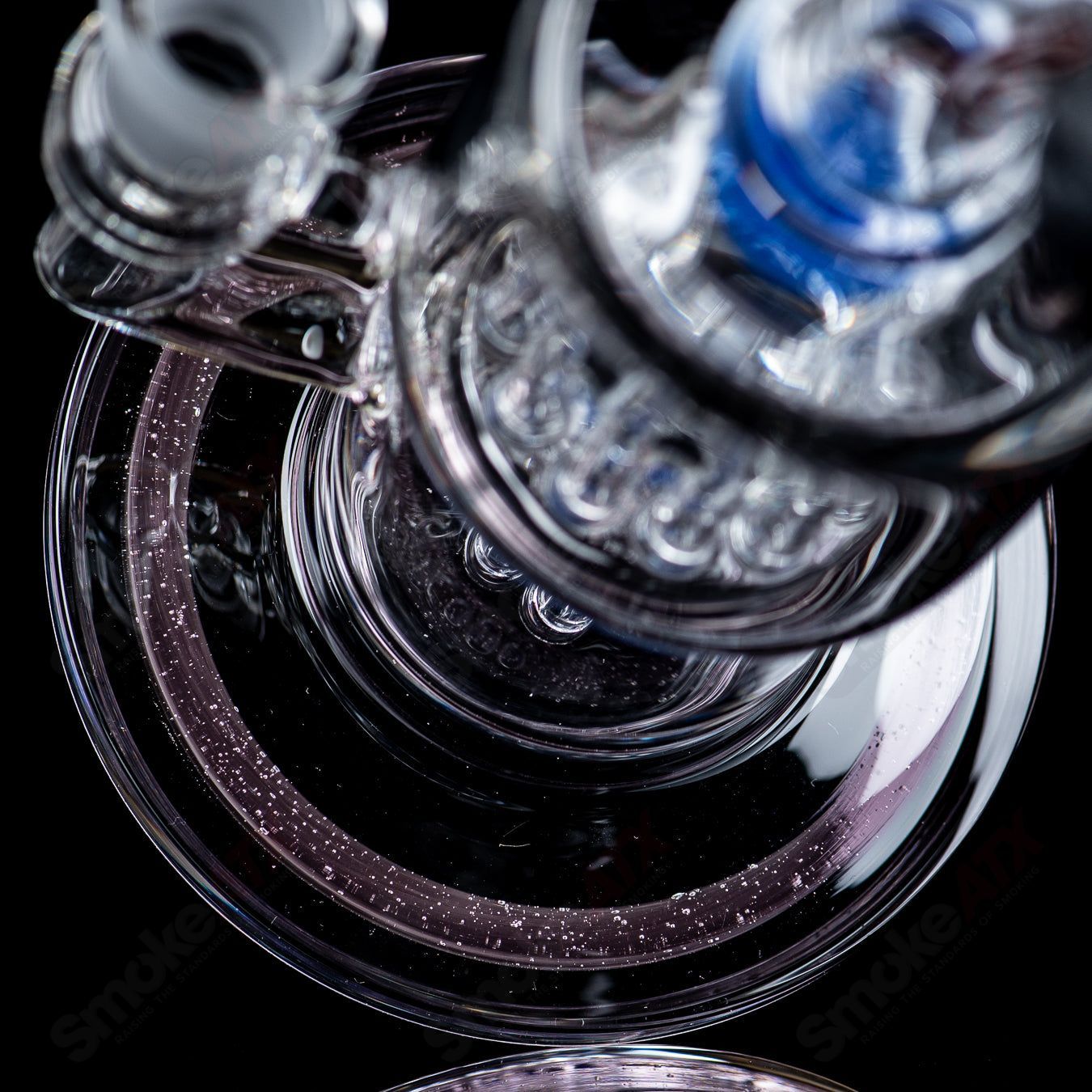Toro Glass 14mm Double Macro XL bubbler with vibrant color accents, featuring intricate glasswork and a sturdy design.