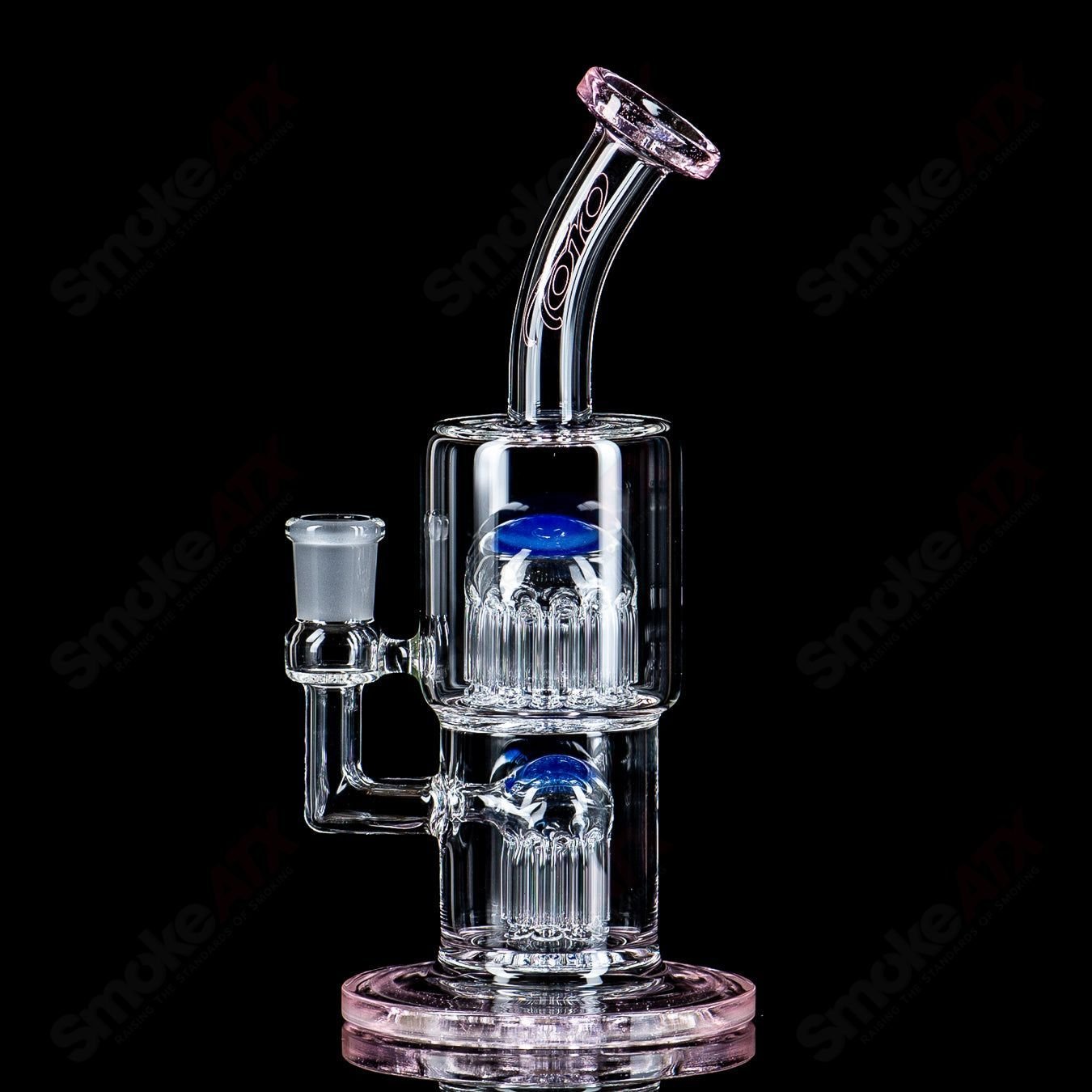 Toro Glass 14mm Double Macro XL bubbler with colorful accents, featuring a sleek glass design and ergonomic mouthpiece.