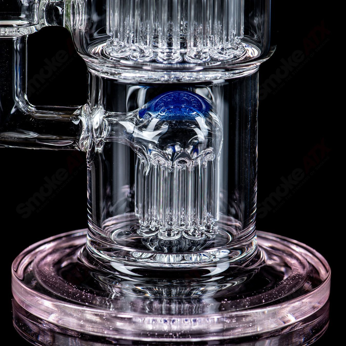 Toro Glass 14mm Double Macro XL bubbler with colorful accents, clear glass design, and compact portable style.