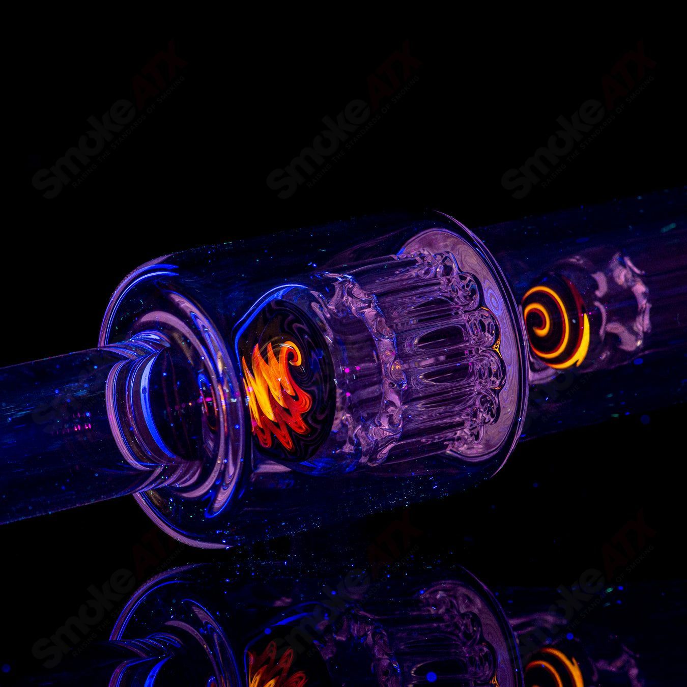Toro Glass 14mm mini 7/13 arm perc straight tube with reversal sections, showcasing clear glass with intricate design.