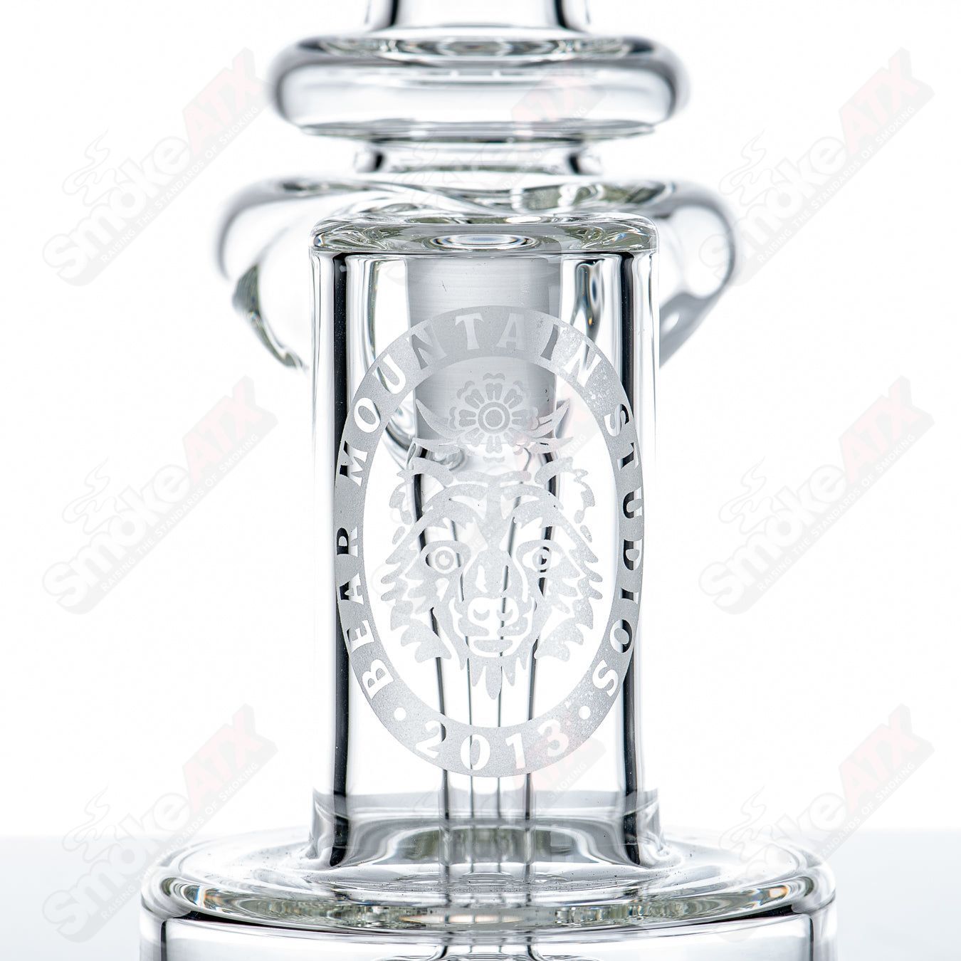 14mm RBR concentrate rig by Bear Mountain Studios, heady glass piece with intricate design and clear glass details.