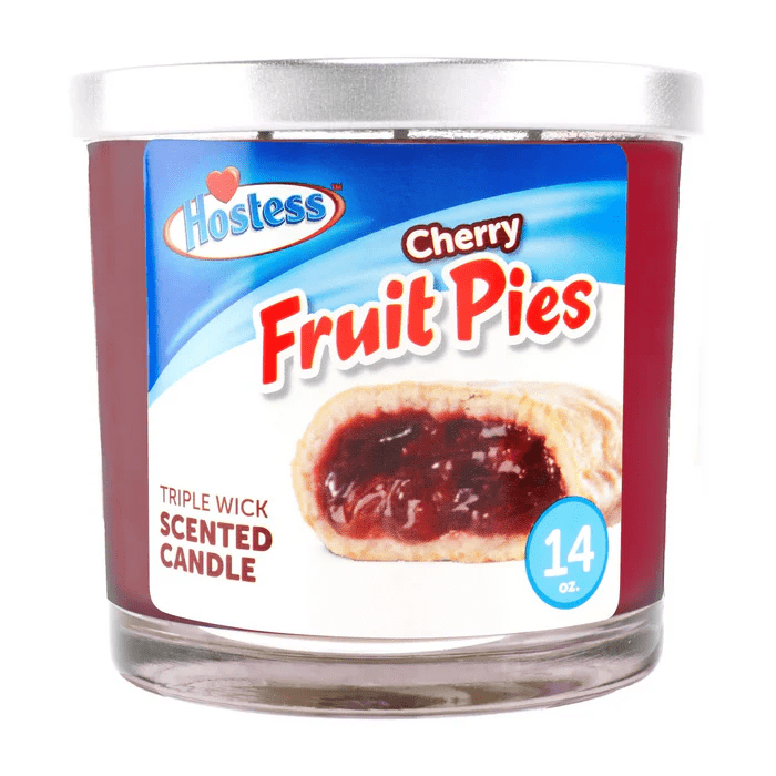 14oz Licensed Snacks scented candles featuring colorful snack-themed packaging and decorative wax designs.