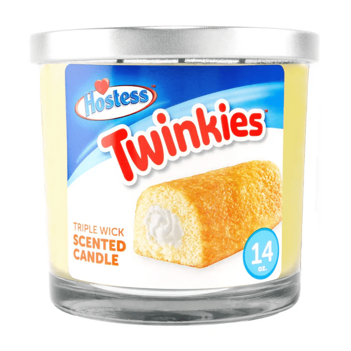14oz Licensed Snacks Scented Candles featuring colorful snack-themed illustrations and a decorative wick for aromatic ambiance.