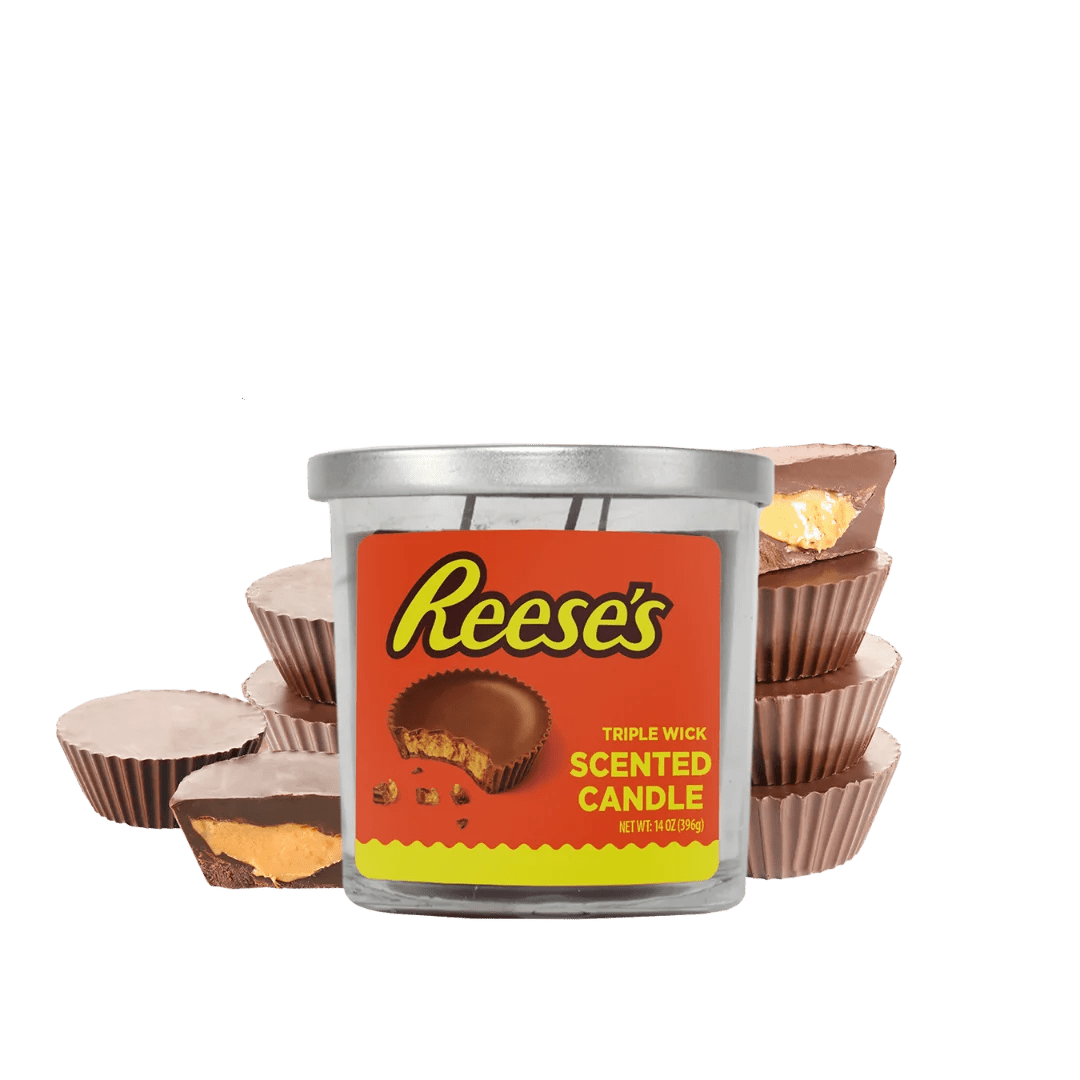 14oz Licensed Snacks scented candles in glass jars, featuring colorful snack-themed designs and decorative wicks.
