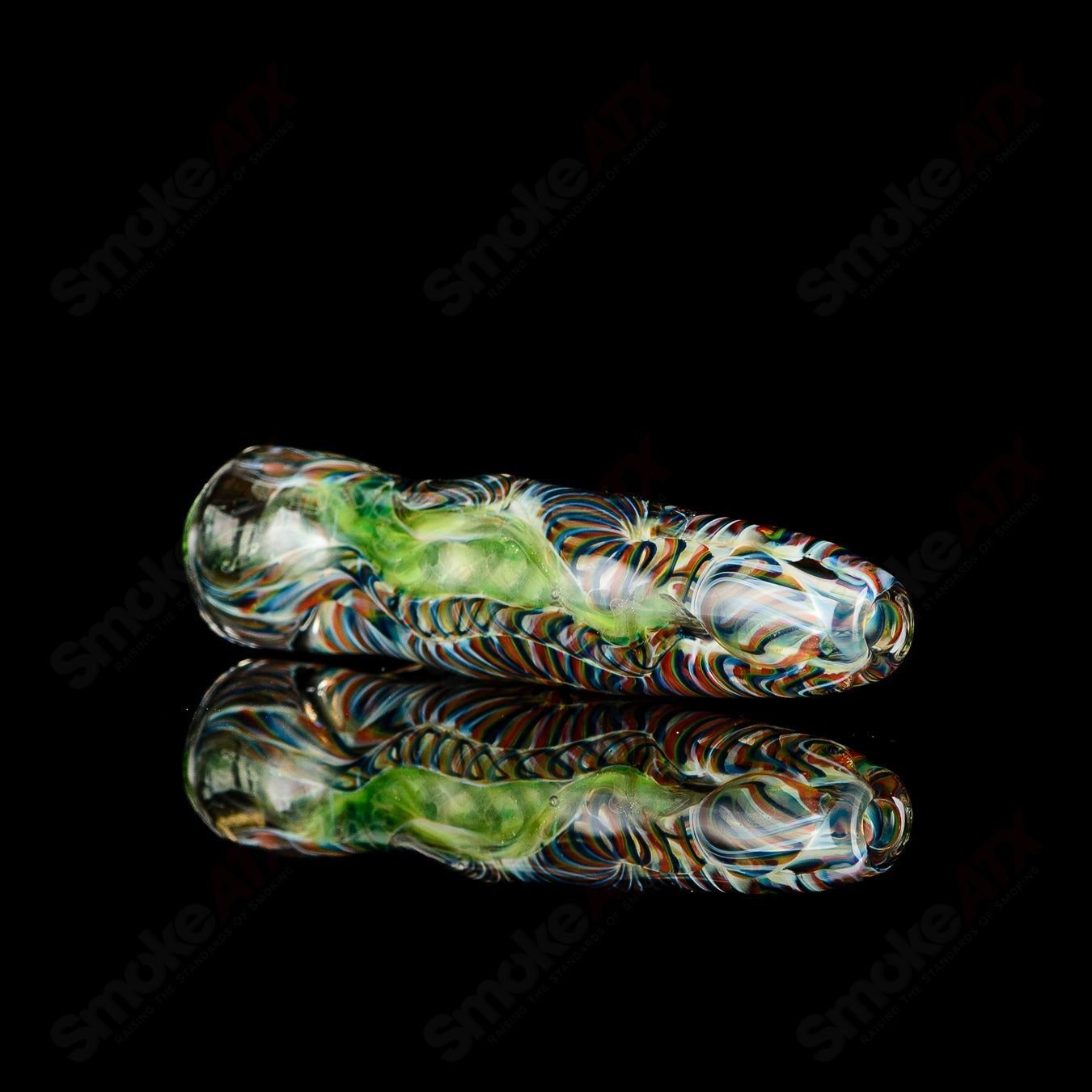 Signed JMK Glass #15 I/O Worked Chillum, clear glass smoking pipe with intricate worked design and signature detail.