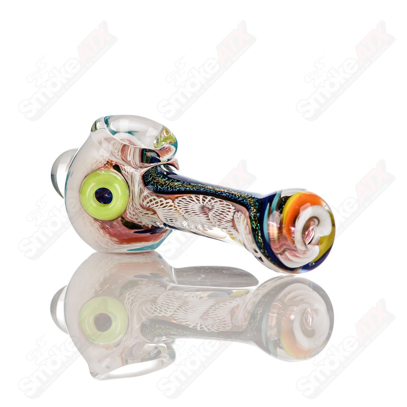Colorful hand pipe by Jeremy from Oregon featuring 16-color worked IO spoon design in vibrant glass artistry.