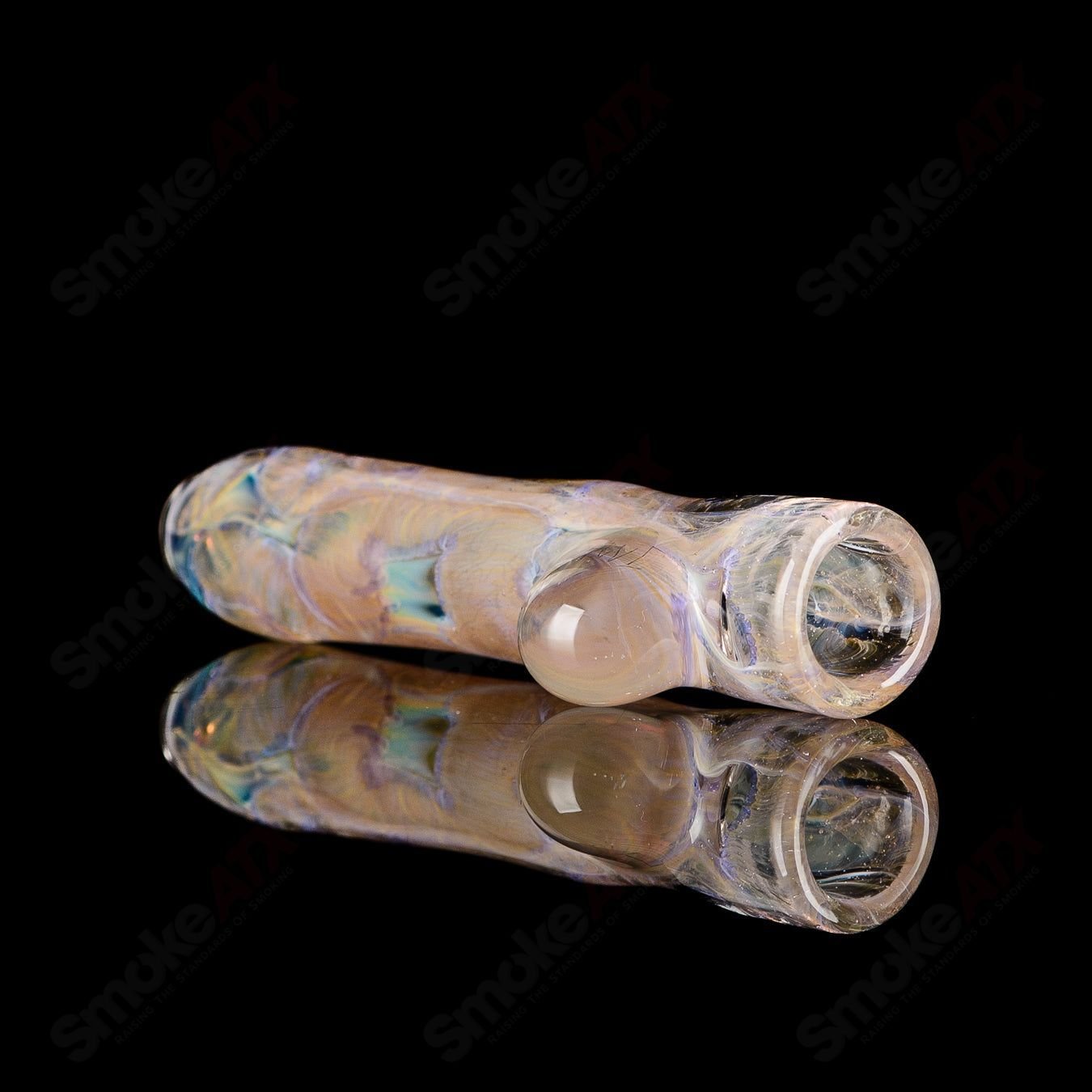 Signed JMK Glass #16 I/O Worked Chillum, clear glass tobacco pipe with intricate worked design and signature detail.