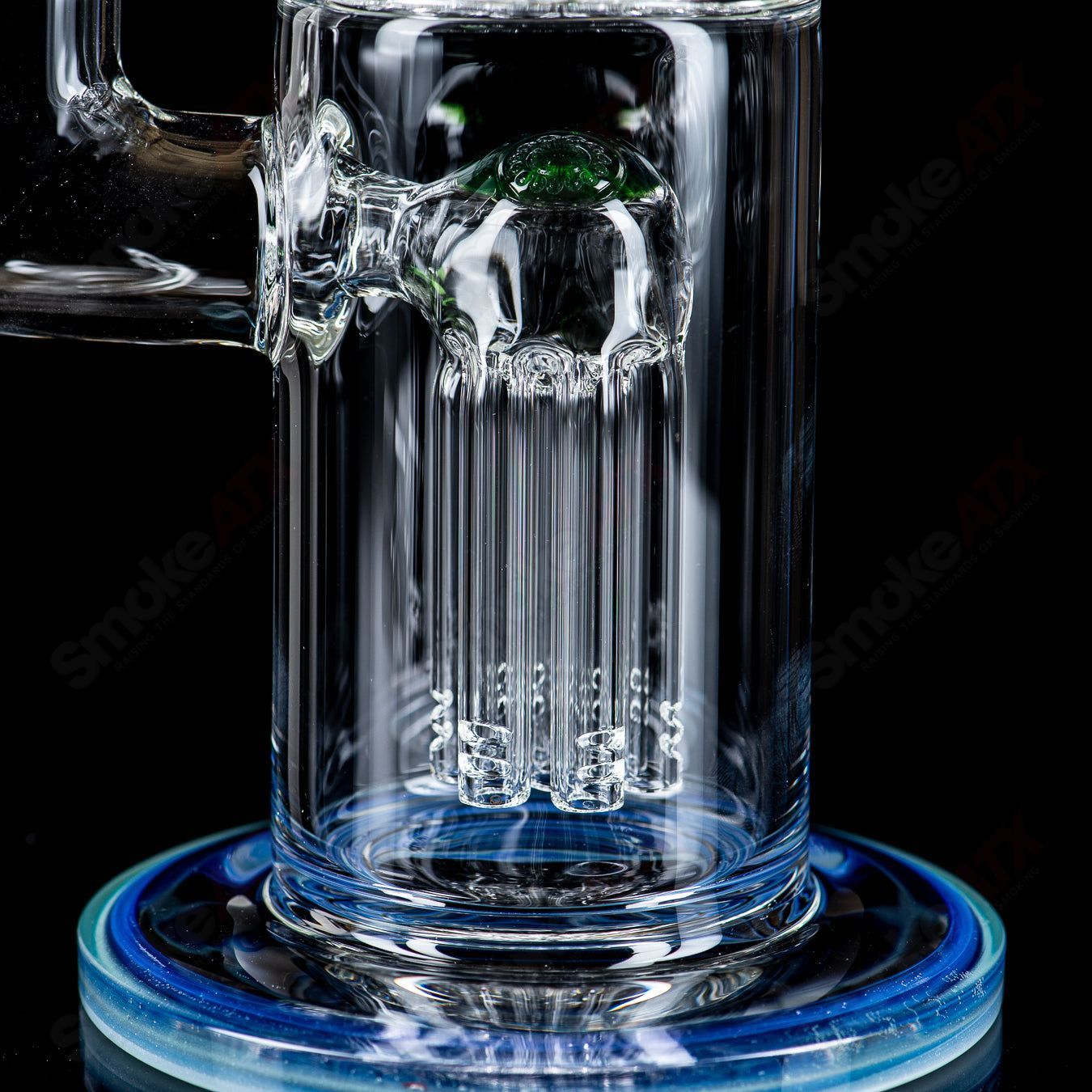 Toro 18mm 7/13 arm perc straight glass tube with colorful cap, designed for smooth smoking experiences.