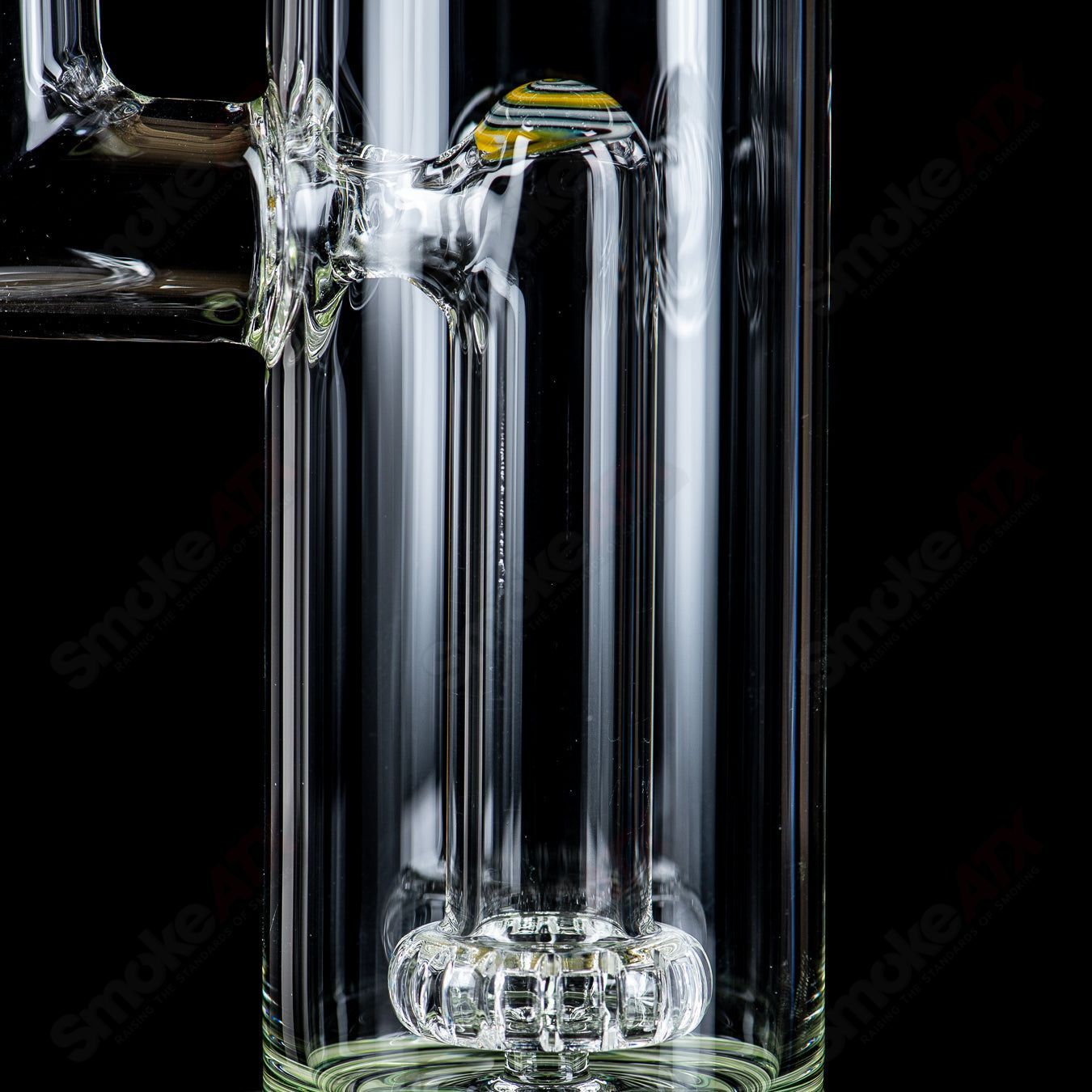 Toro Glass 18mm circular to 13-arm perc concentrate rig with reversal sections, heady glass design for smooth dabbing and filtration.