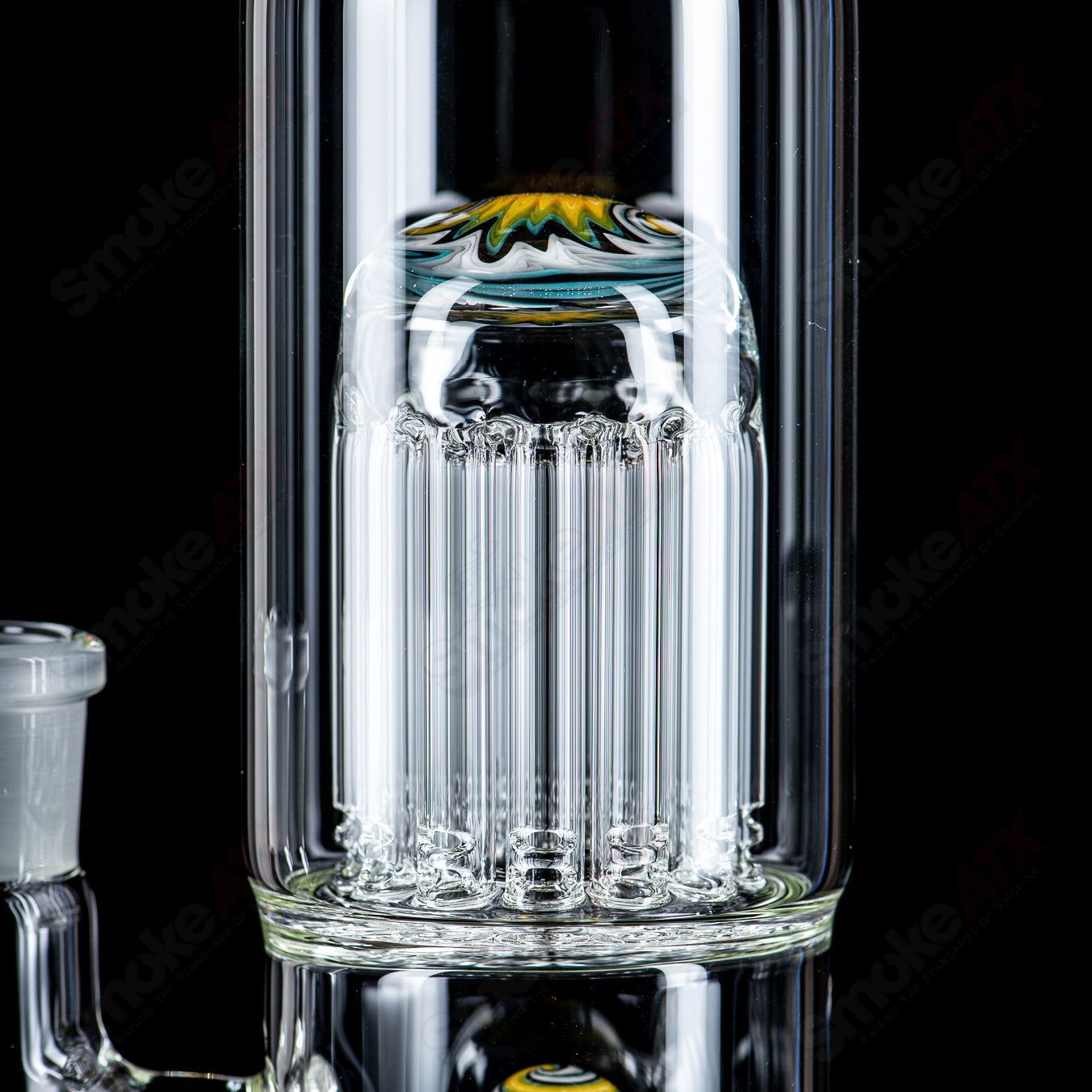 Toro Glass 18mm circular to 13-arm perc concentrate rig with reversal sections, designed for smooth, efficient dabbing.