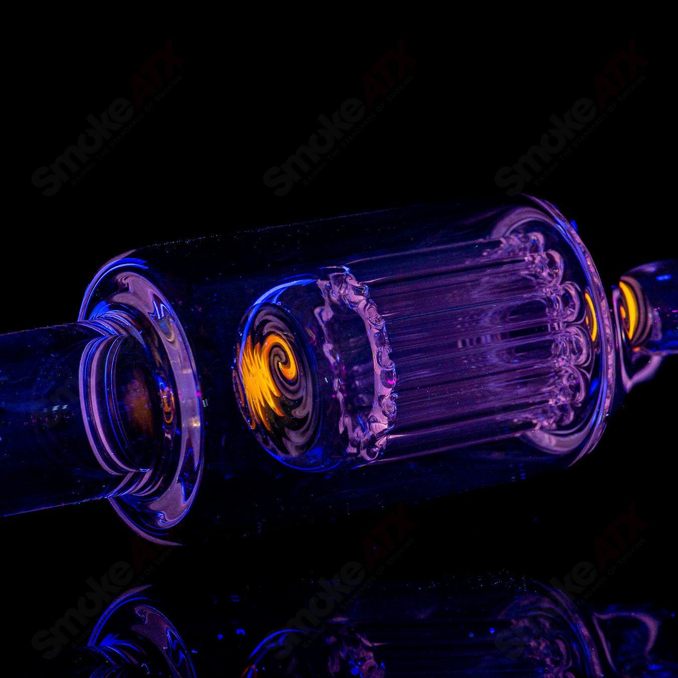 Toro Glass 18mm circular to 13-arm perc concentrate rig with reversal sections, designed for smooth, high-quality concentrates.