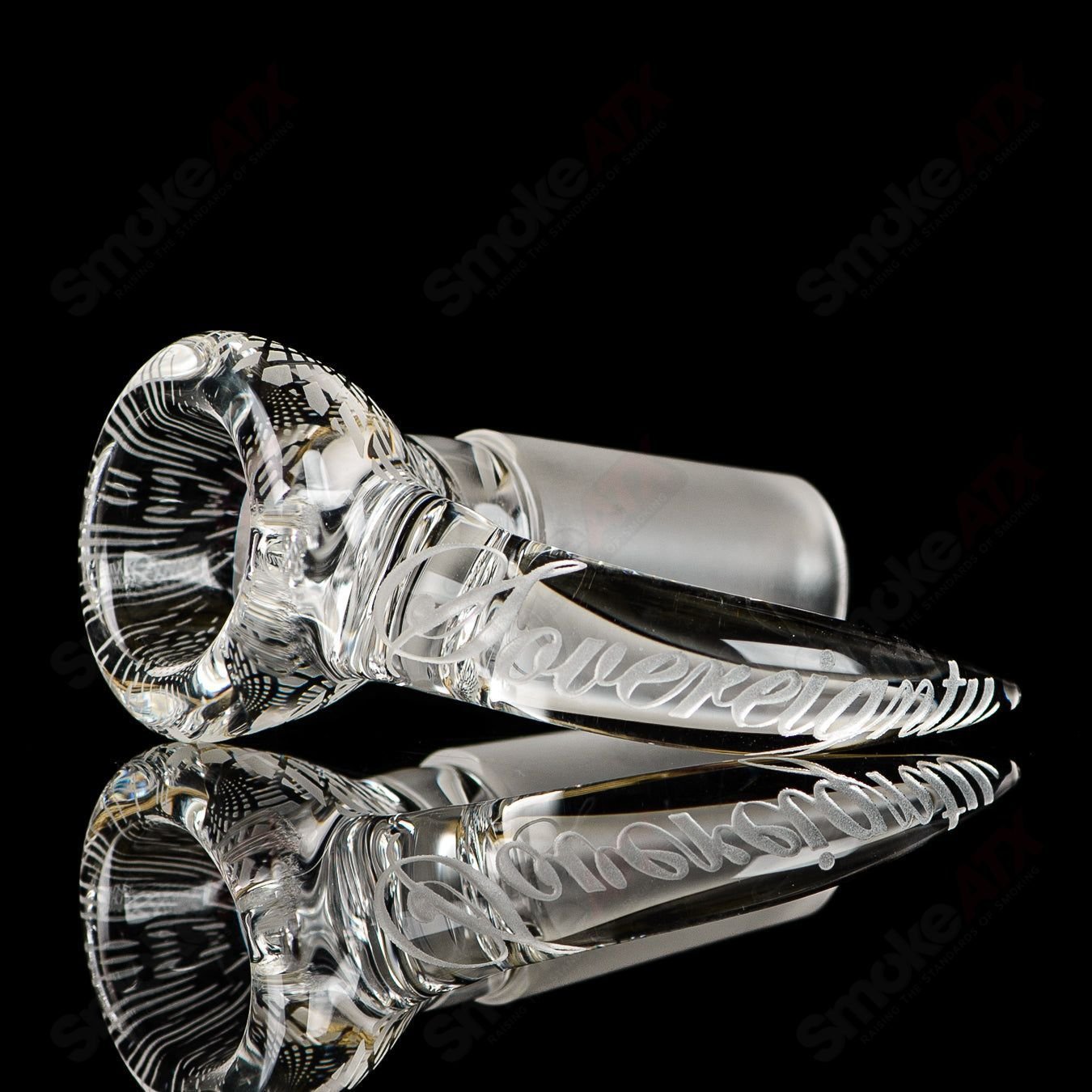 Clear patterned 18mm slide by Sovereignty Glass, designed for heady glass bowls, featuring intricate glasswork and a sleek finish.