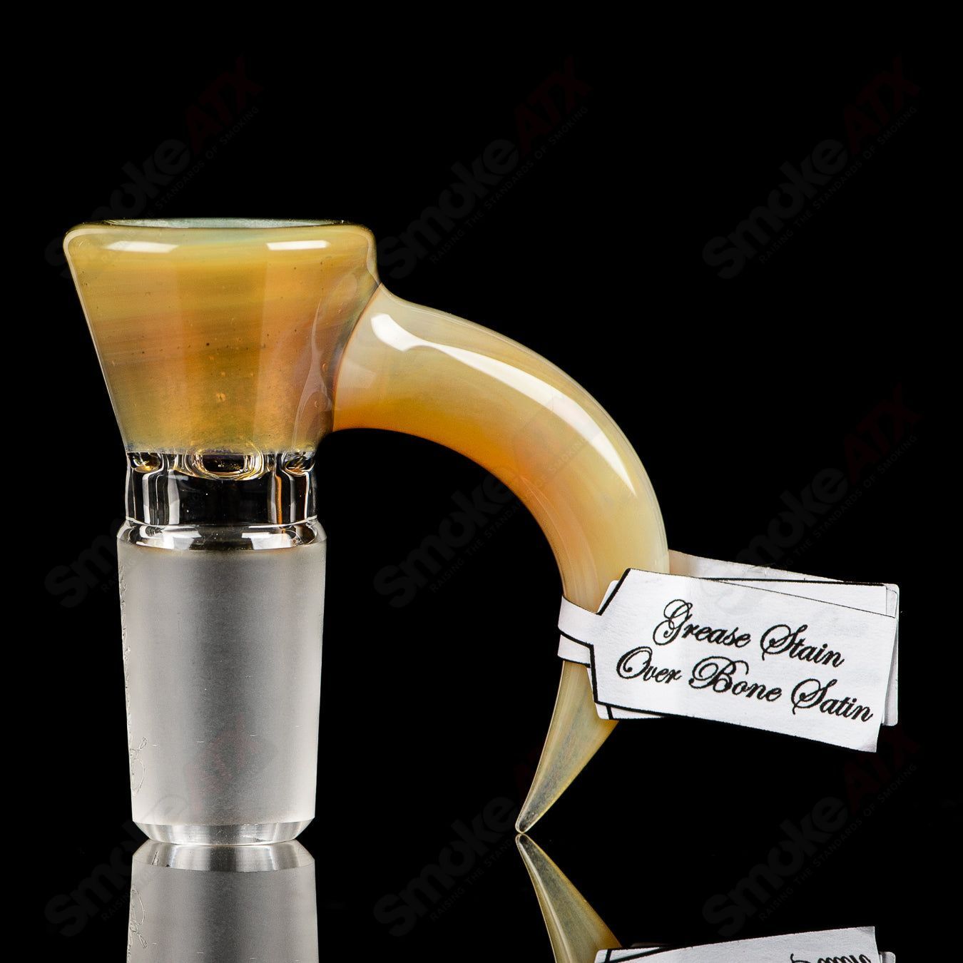 Sovereignty Glass 18mm Full Accent Slide with grease stain over creamy white satin finish, designed for heady glass bowls.