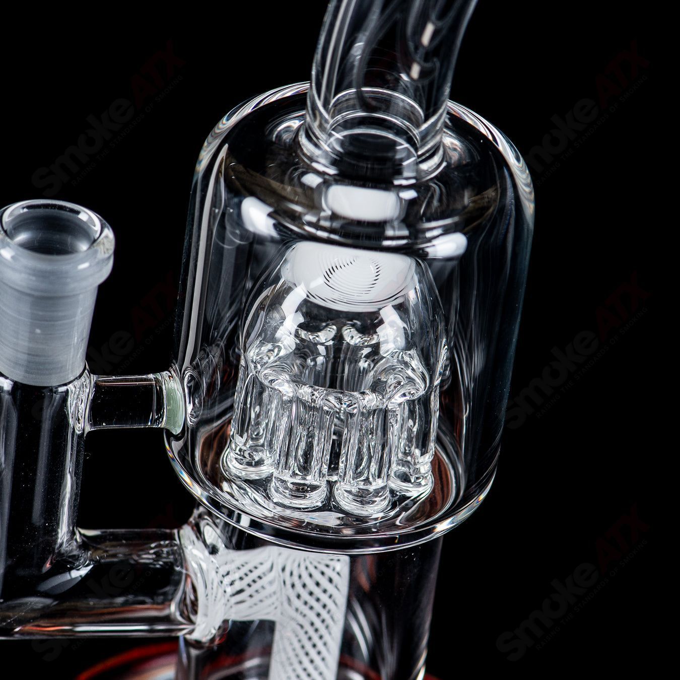 Toro Glass 10mm Double Macro concentrate rig with colorful caps, featuring intricate glasswork and sturdy design.