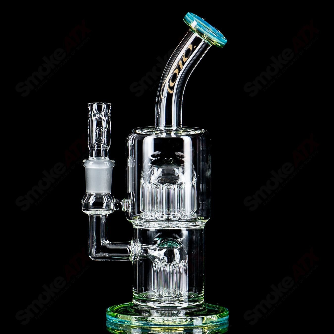 Toro Glass 14mm Double Macro XL bubbler with colorful accents, featuring a sturdy glass design and intricate details.