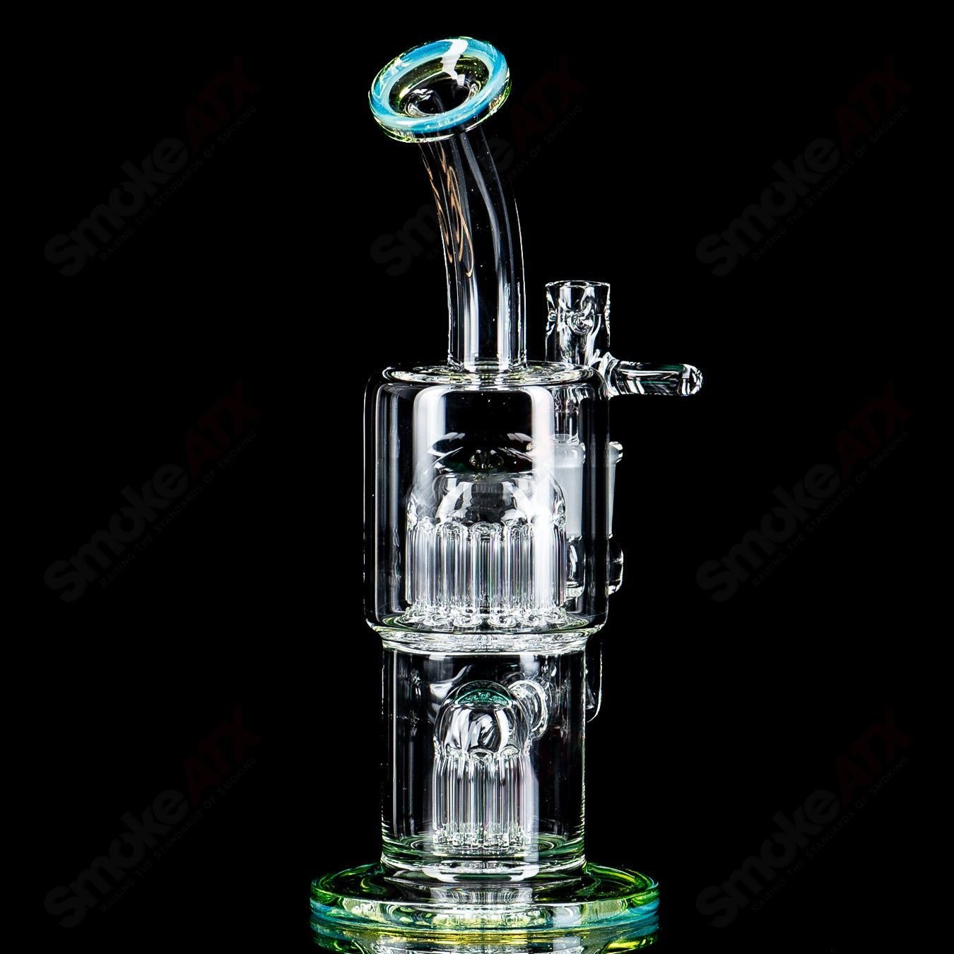 Toro Glass 14mm Double Macro XL bubbler with color accents, clear glass with vibrant decorative details.