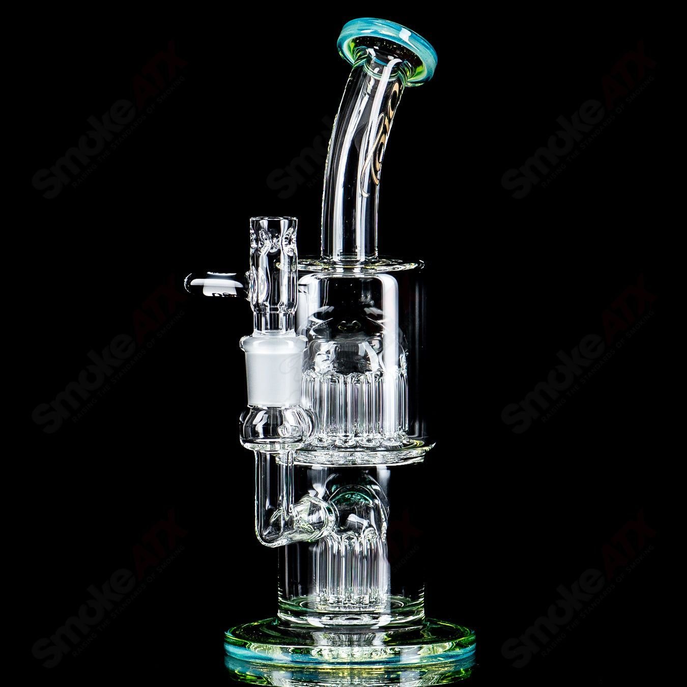 Toro Glass 14mm Double Macro XL Bubbler with color accents, featuring intricate glasswork and vibrant design details.