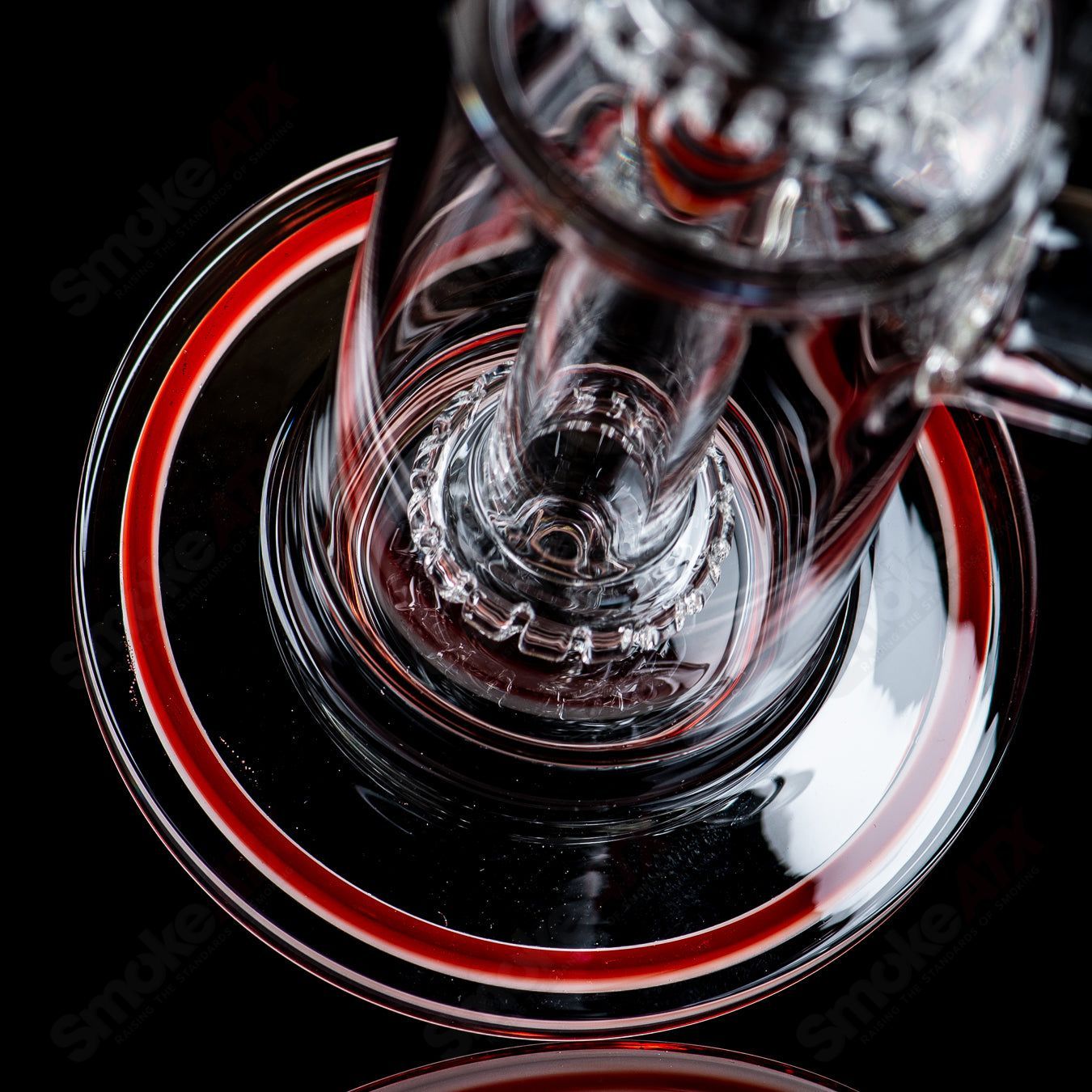 Toro Glass 18mm full-size straight glass tube with circular design and reversal sections, designed for cannabis or water pipes.