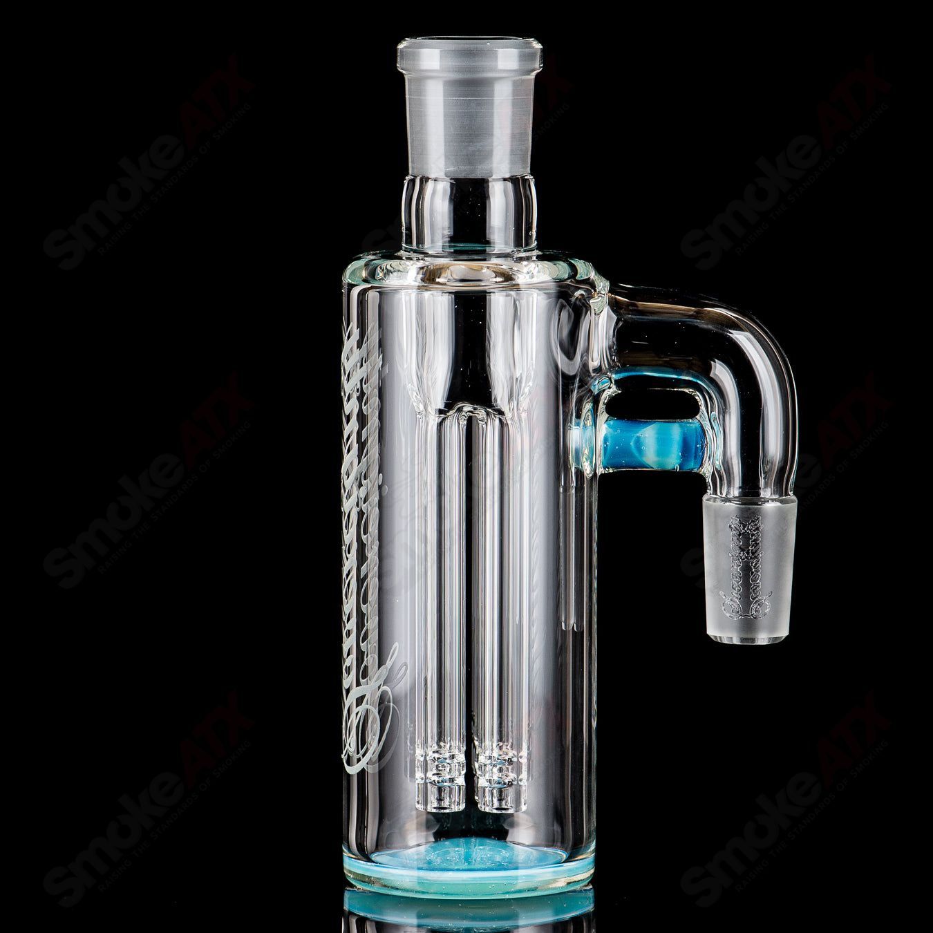 Sovereignty Glass 2-4 arm color accent ash catcher for glass pipes, featuring vibrant colored accents and clear glass construction.