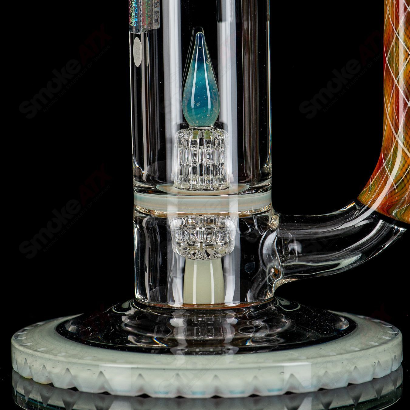 Mobius 45T V1 glass waterpipe with splashtrap elements, featuring intricate glasswork and a sleek design for smooth smoking.