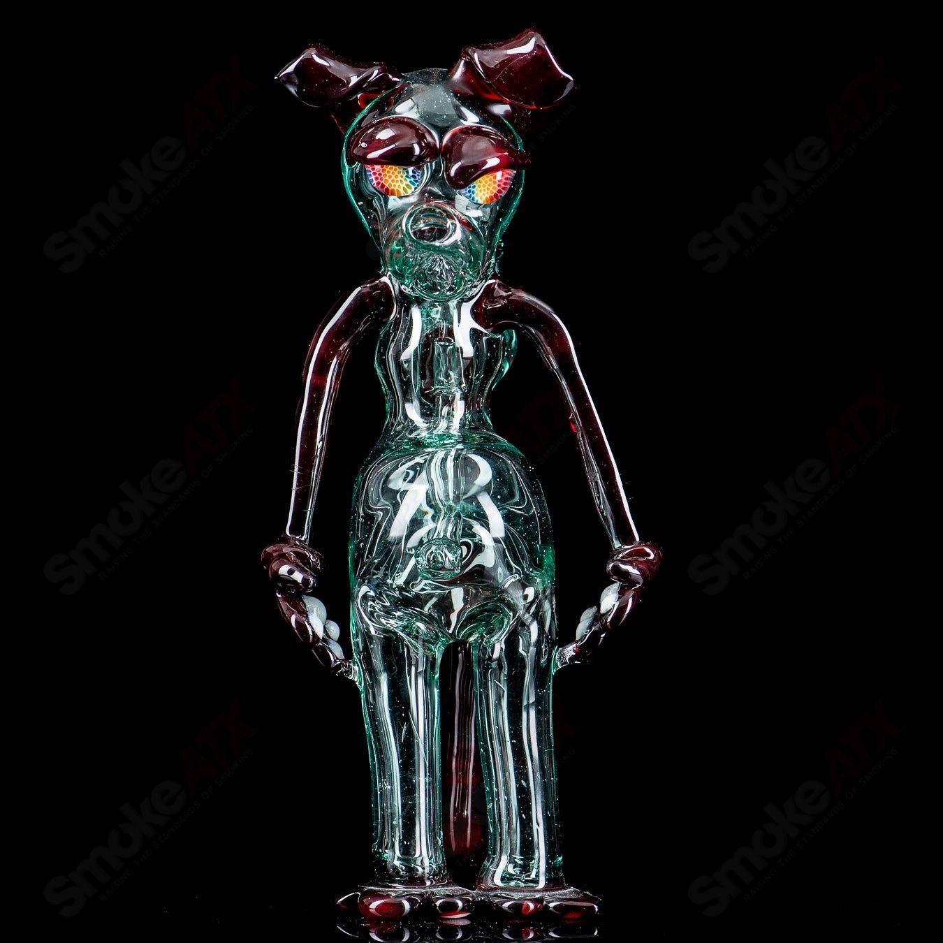 Full-size T-Tree Dog Rig glass concentrate rig featuring a standing design with two dog-shaped glass accents.