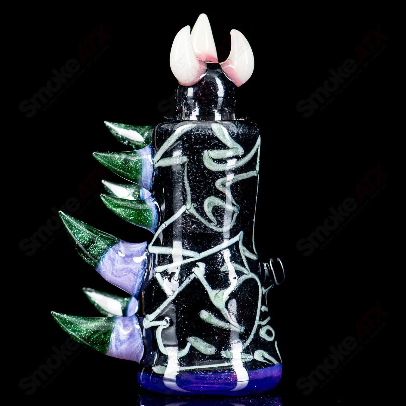 Salt Glass Dome Conversion ISO Jar, a clear heady glass container with a dome lid for storing and displaying concentrates.