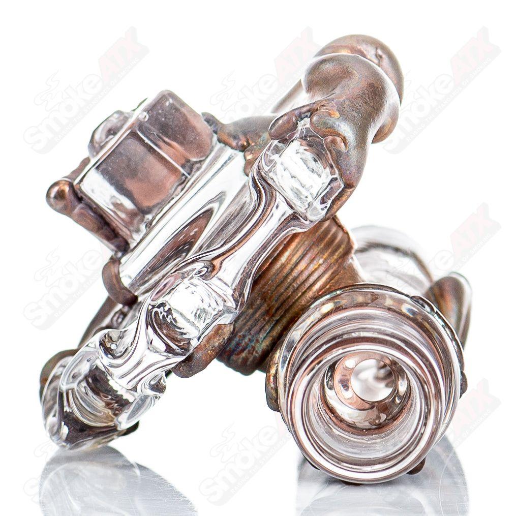 Glass electroformed gear chillum by Zack P x Snic, featuring intricate gear design and clear glass construction.