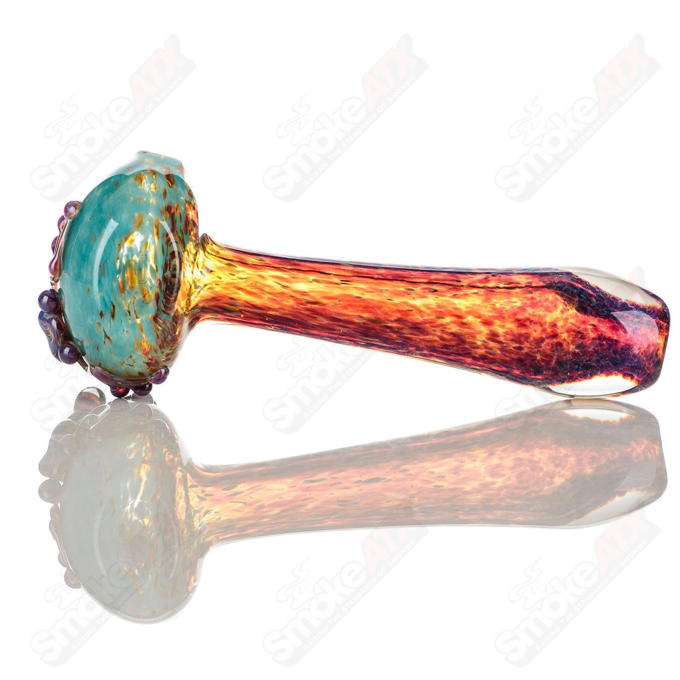 Beezy Glass Frog Spoon Pipe, clear glass with green and yellow frog design, smooth mouthpiece and rounded bowl.